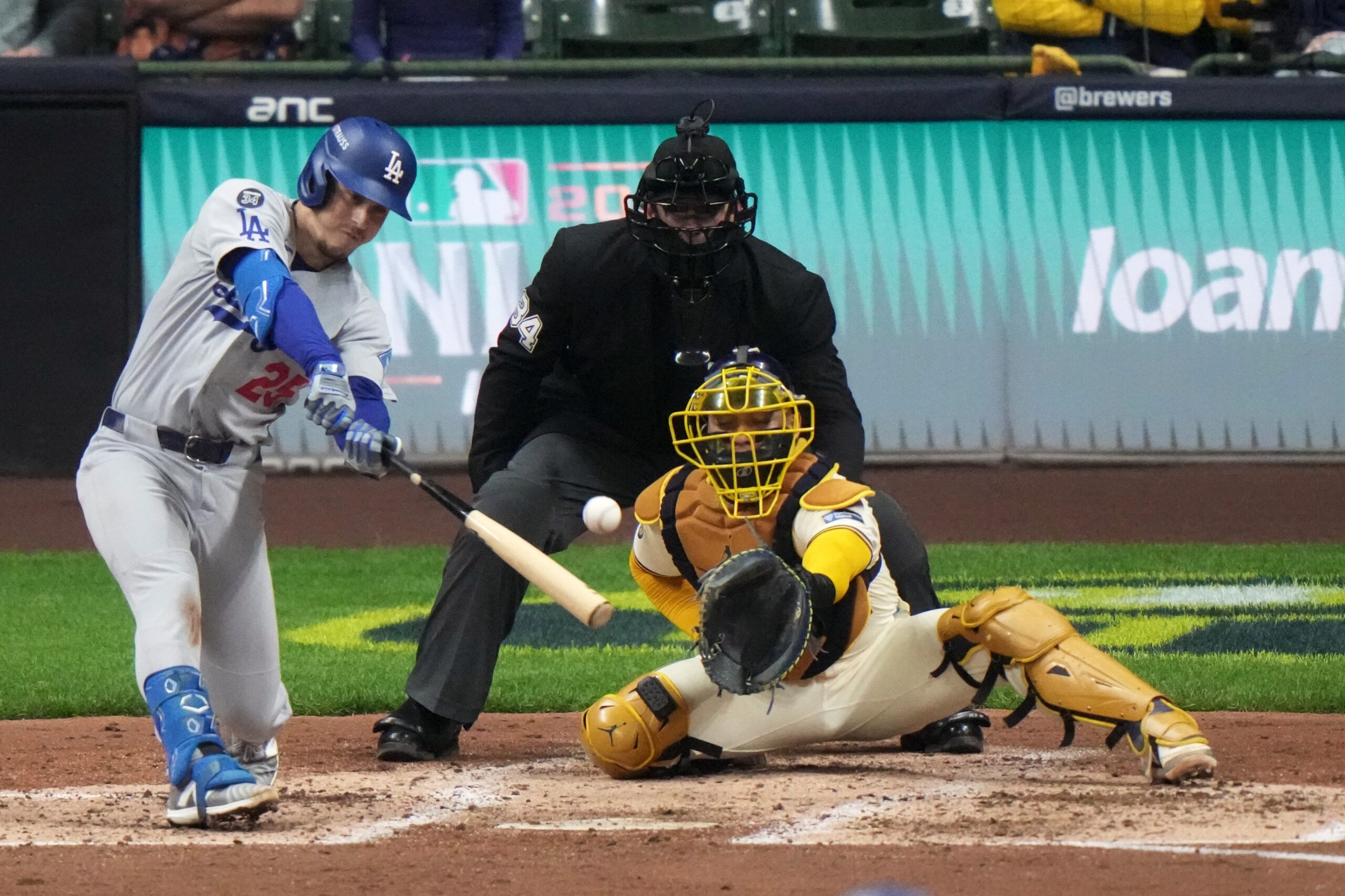 The Dodgers’ Tommy Edman hits a single during the fourth...