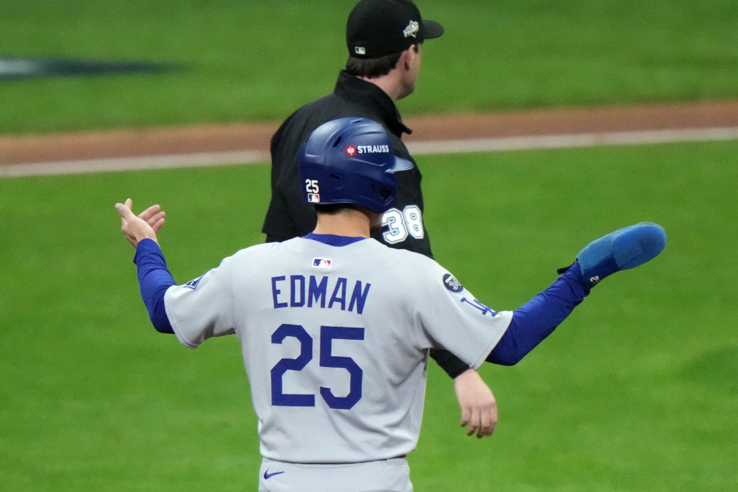 The Dodgers’ Tommy Edman reacts after a double play during...