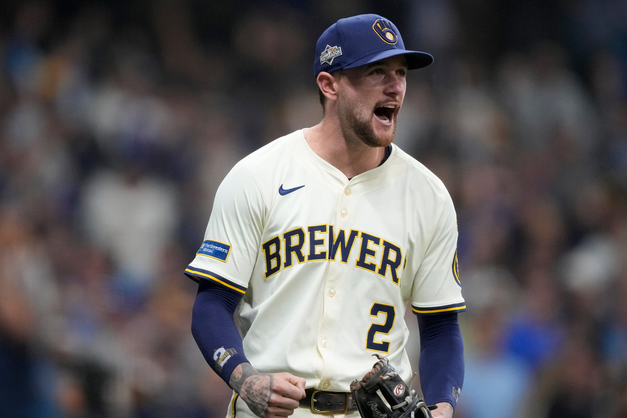 Milwaukee Brewers second baseman Brice Turang celebrates after the last...