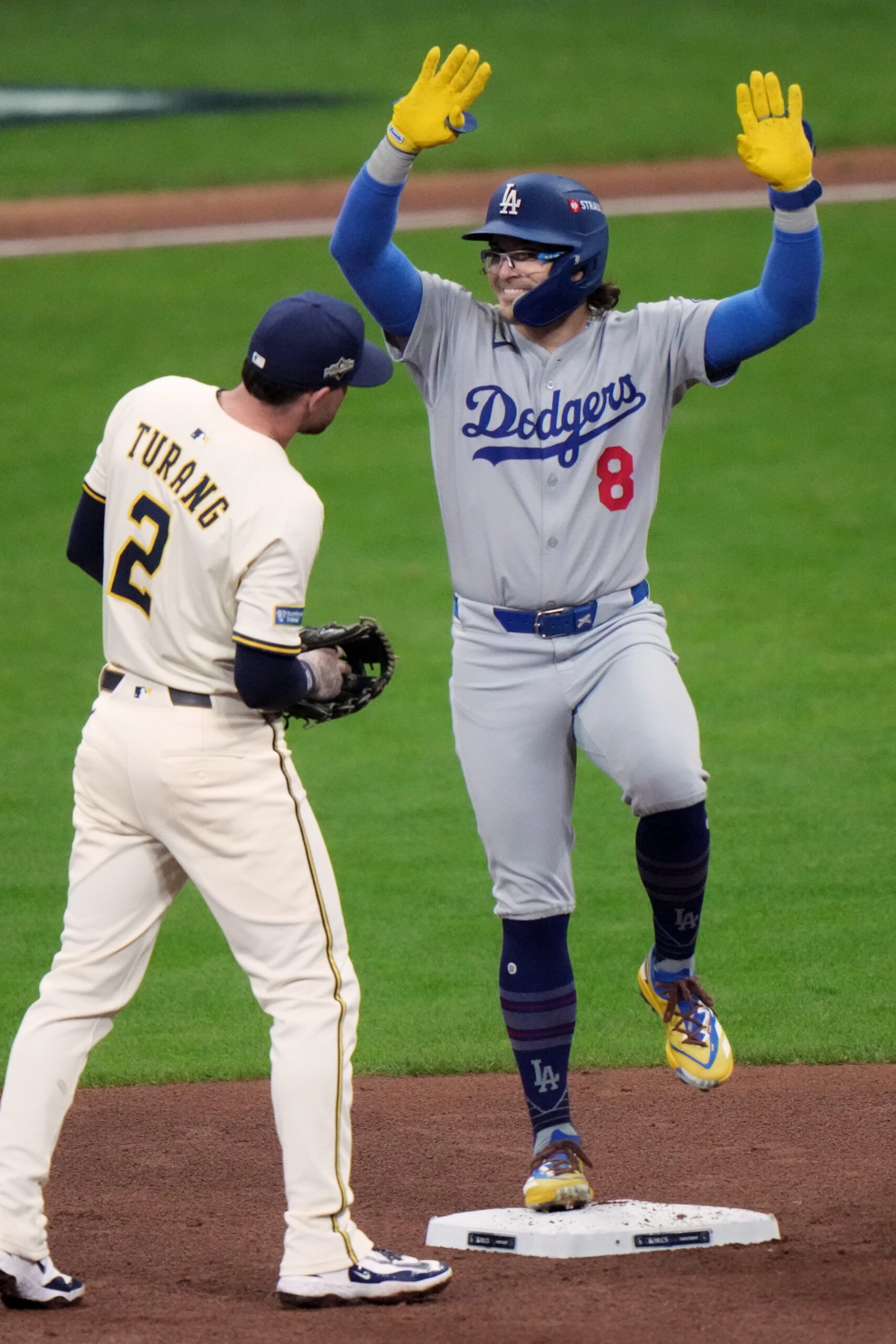 The Dodgers’ Kike Hernández reacts after hitting a double during...