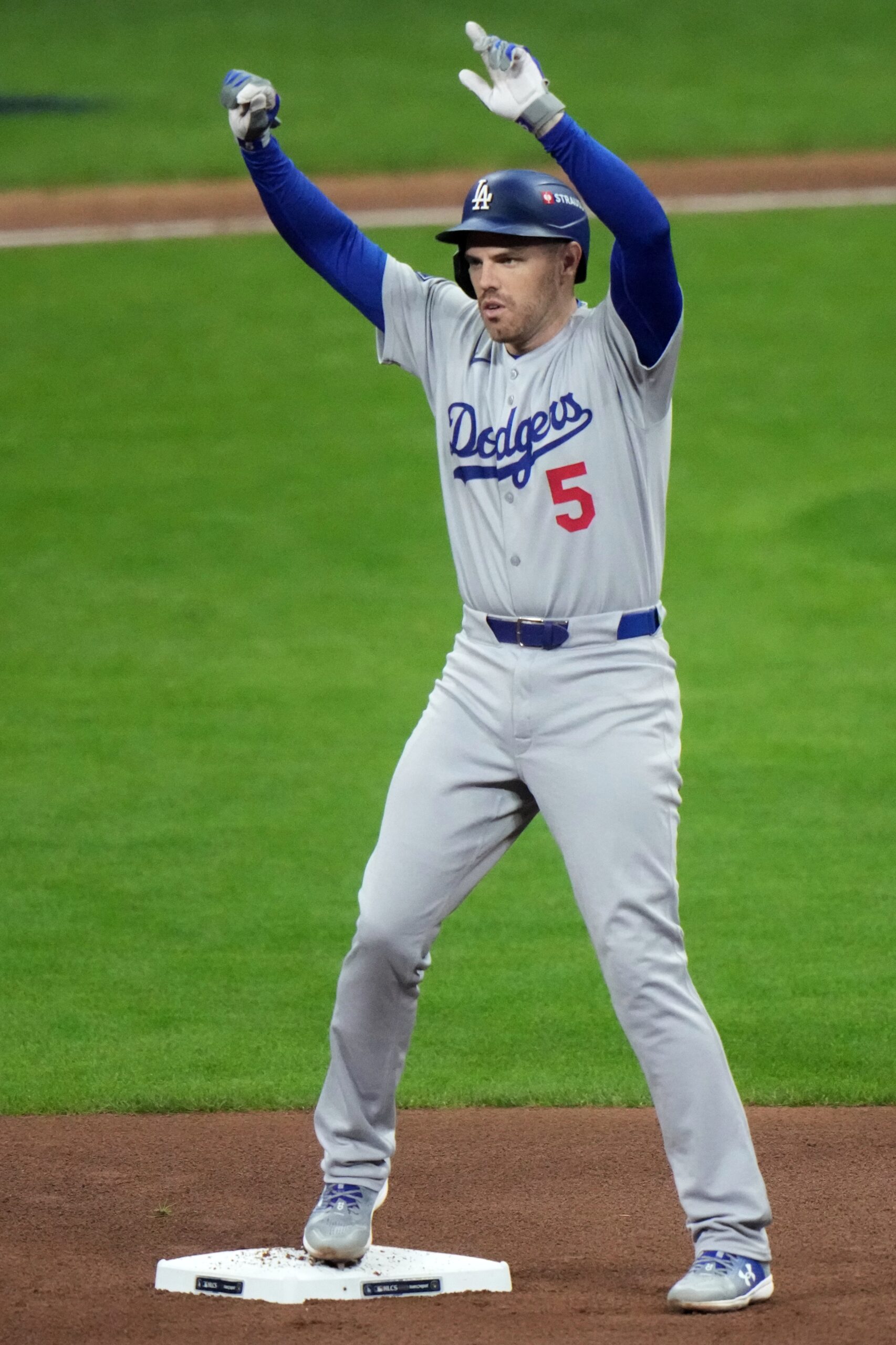 The Dodgers’ Freddie Freeman reacts after hitting a double during...