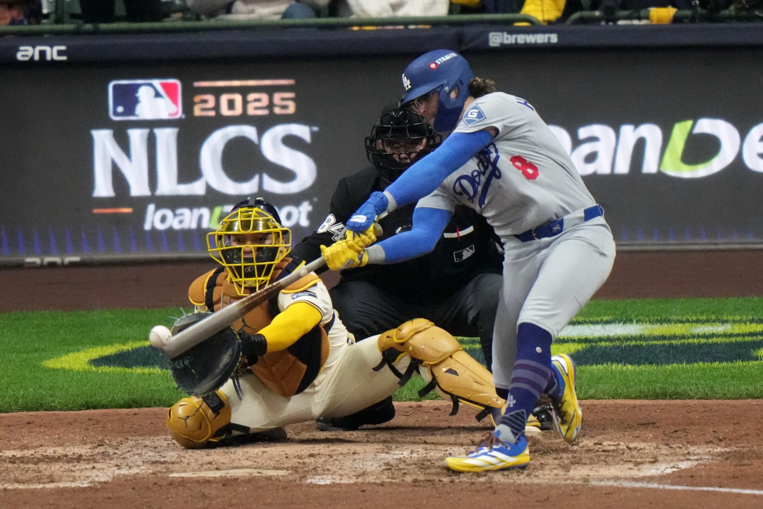 The Dodgers’ Kike Hernández hits a single during the ninth...