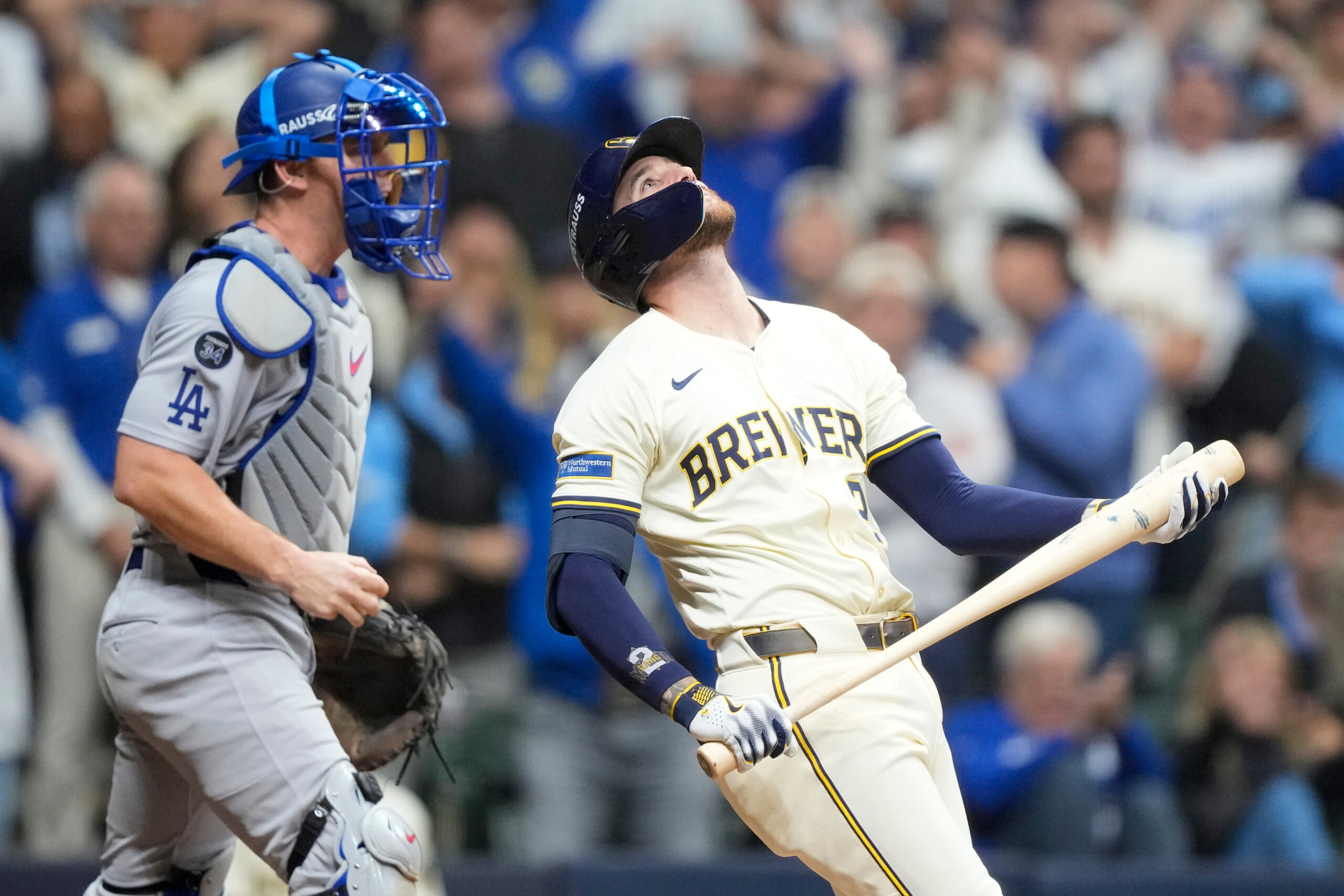 The Milwaukee Brewers’ Brice Turang reacts after striking out with...