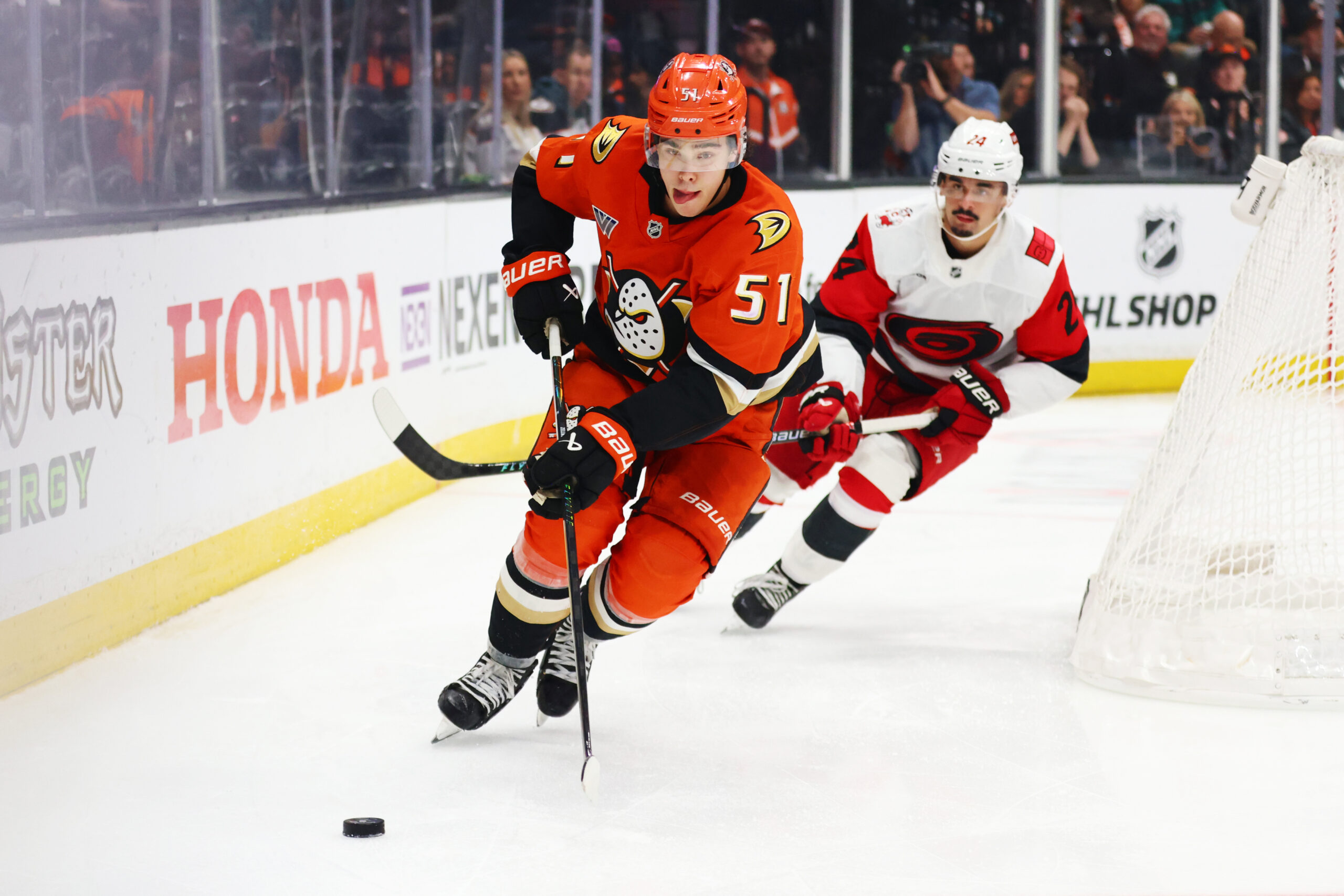 Ducks defenseman Olen Zellweger (51) controls the puck against Carolina...