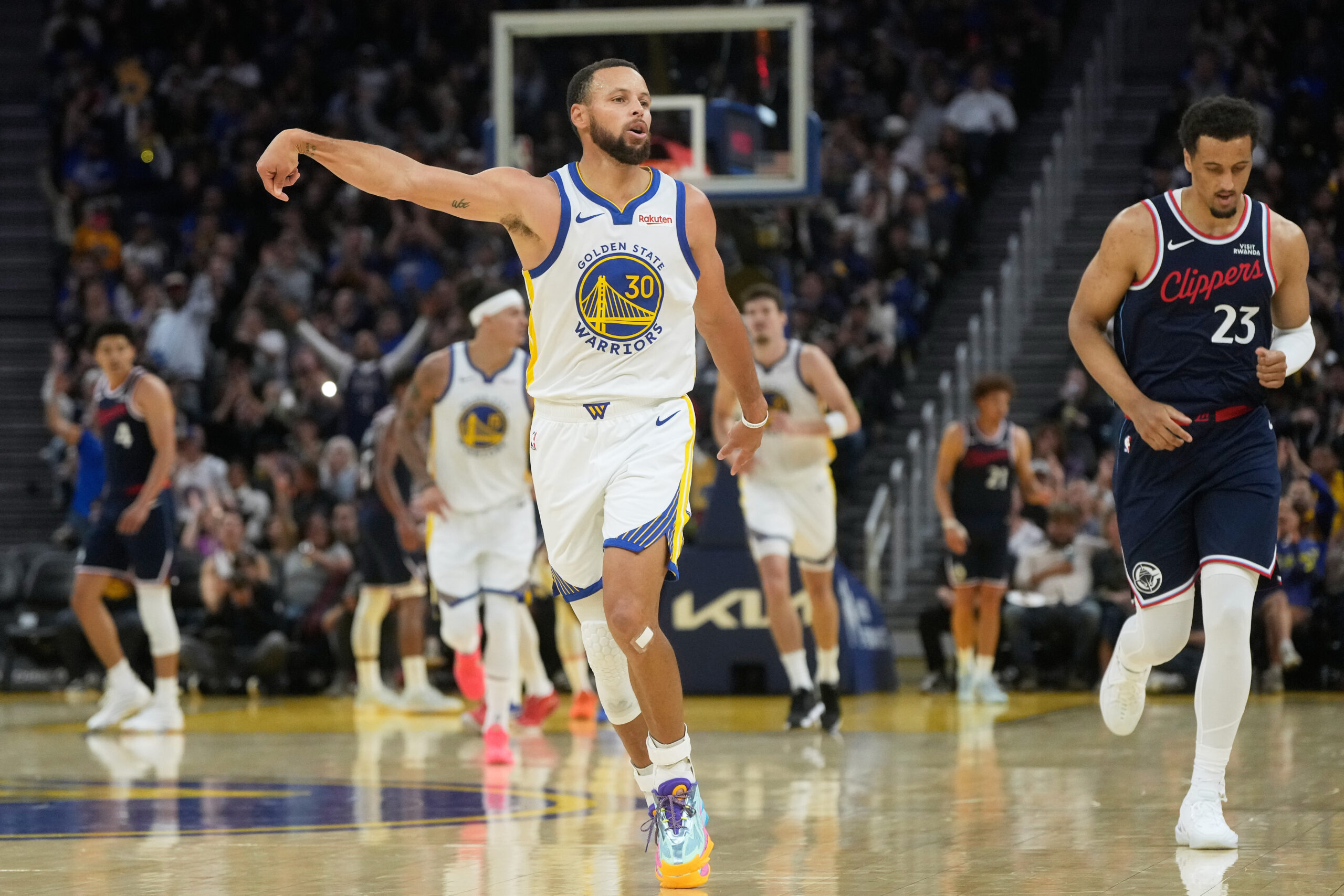 Golden State Warriors guard Steph Curry reacts after making a...