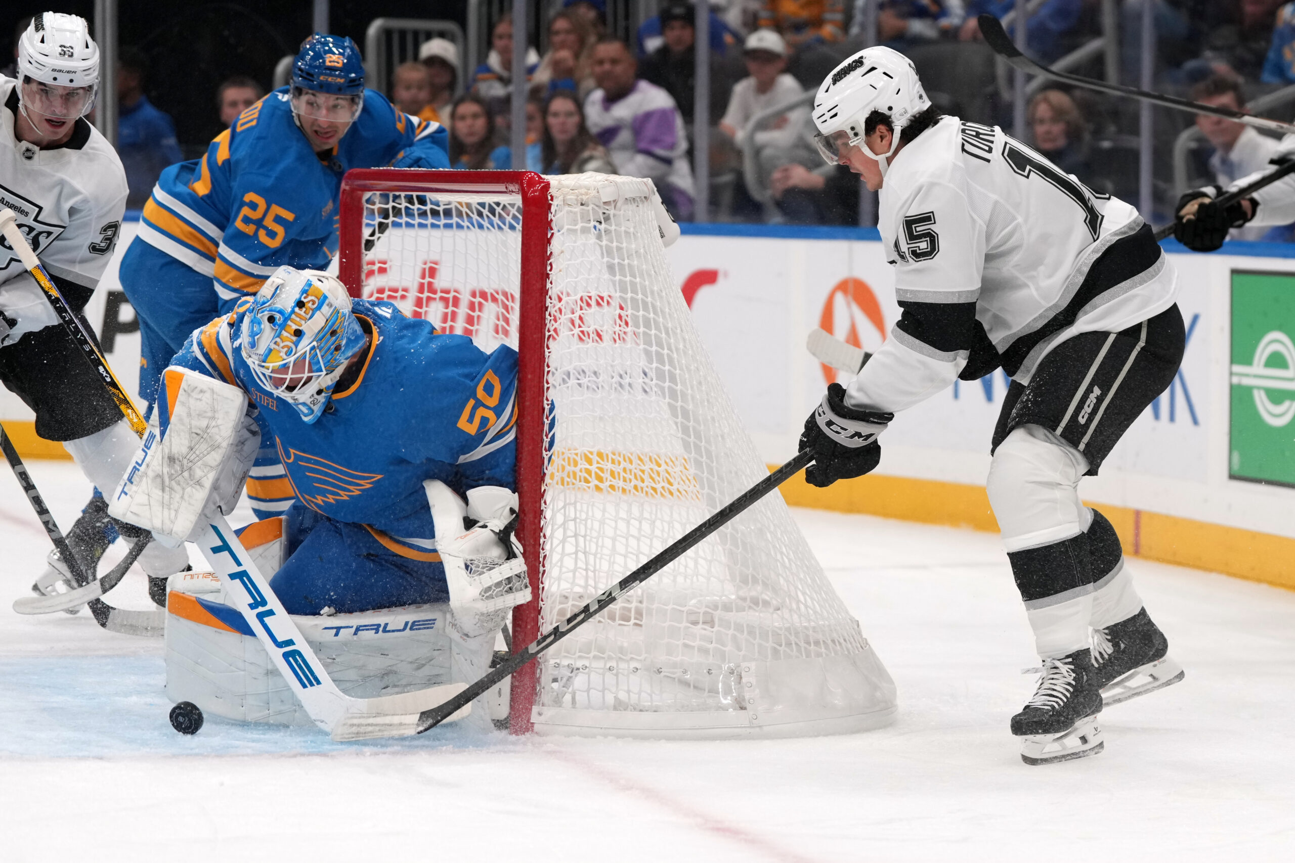 The Kings’ Alex Turcotte (15) is unable to score past...