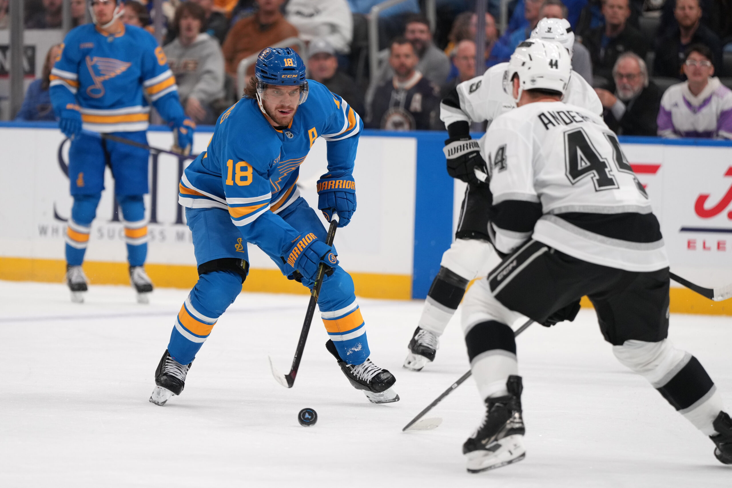 The St. Louis Blues’ Robert Thomas (18) controls the puck...