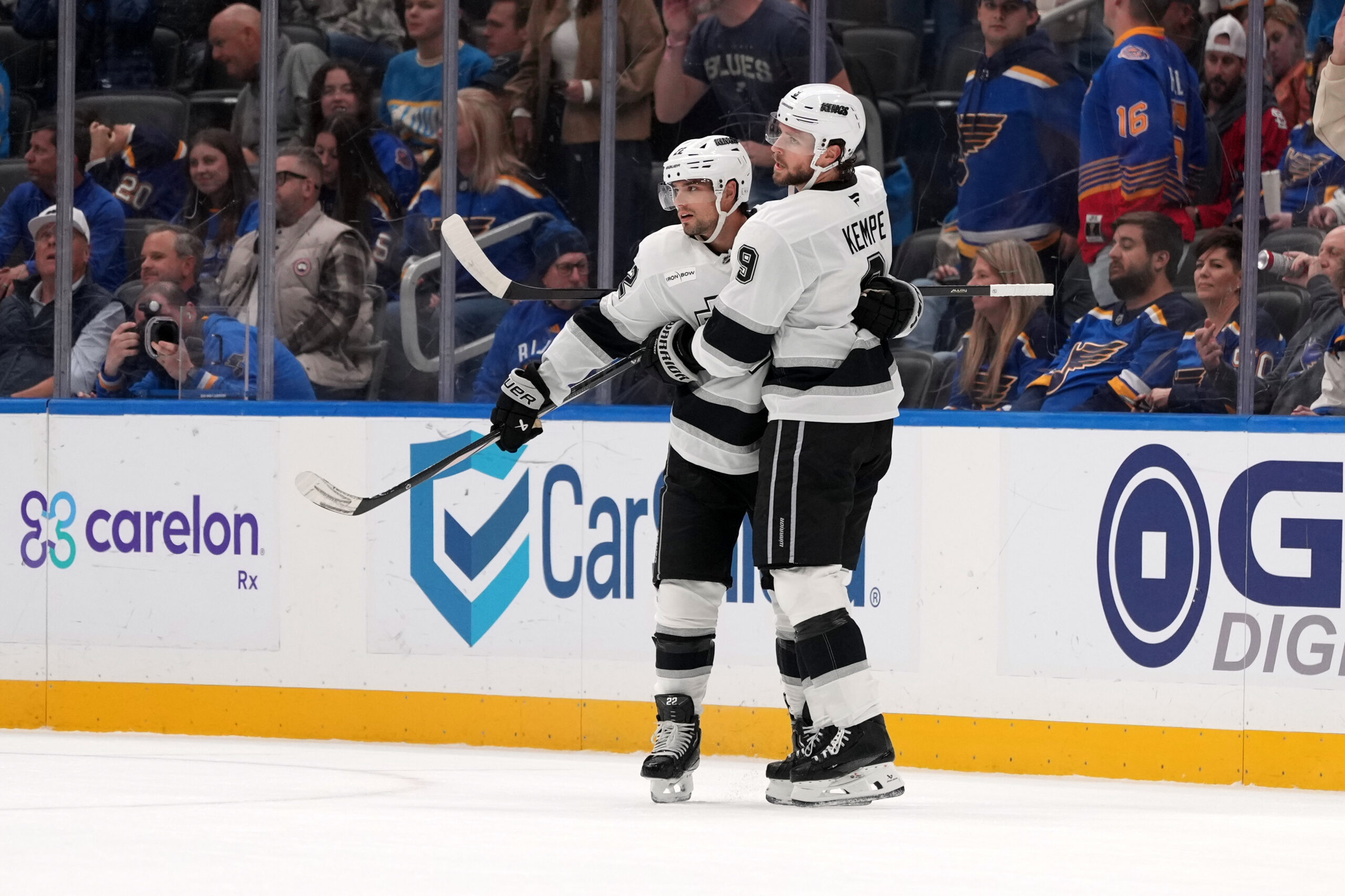 The Kings’ Adrian Kempe, right, is congratulated by teammate Kevin...