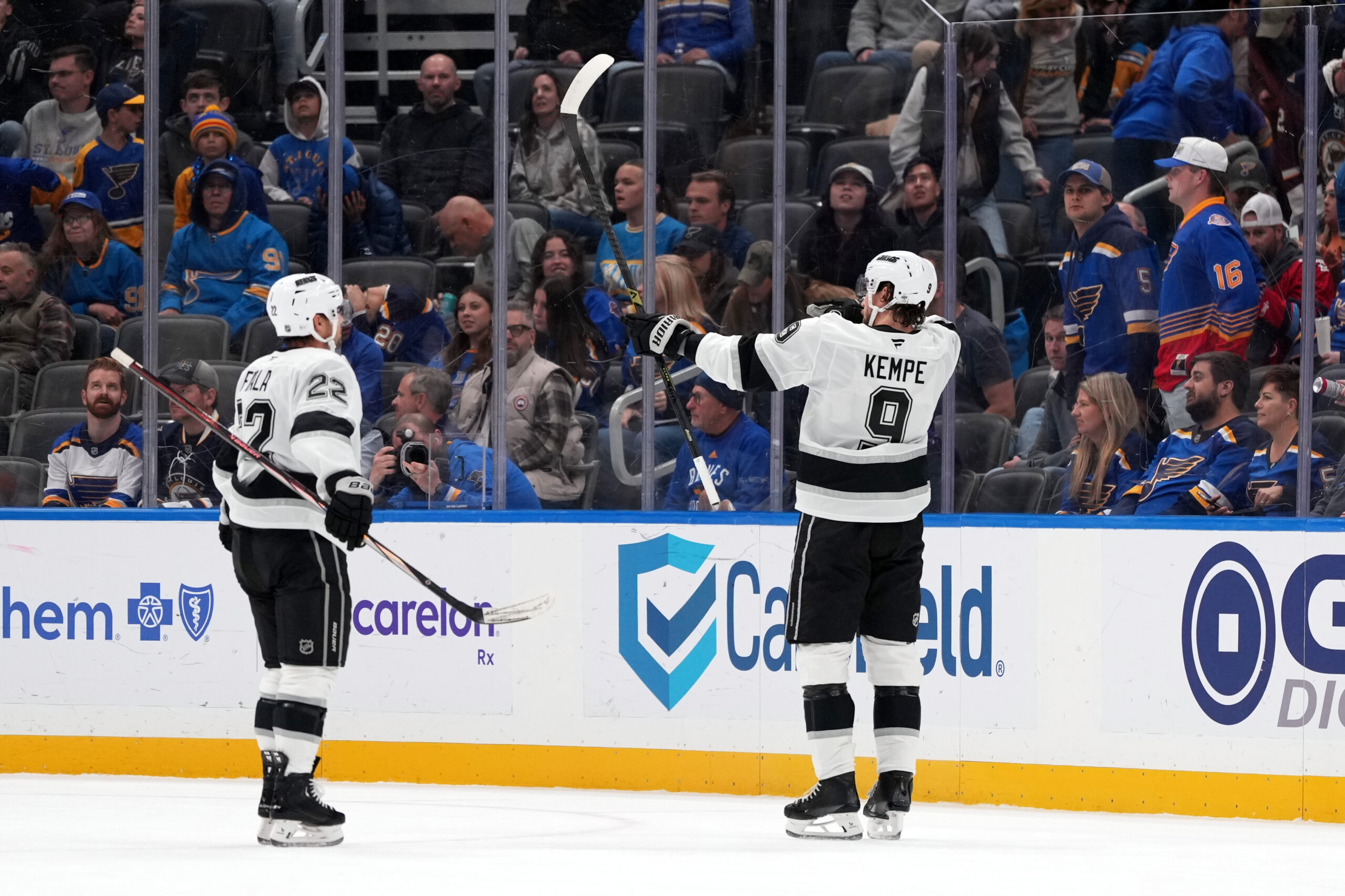 The Kings’ Adrian Kempe, right, is congratulated by teammate Kevin...