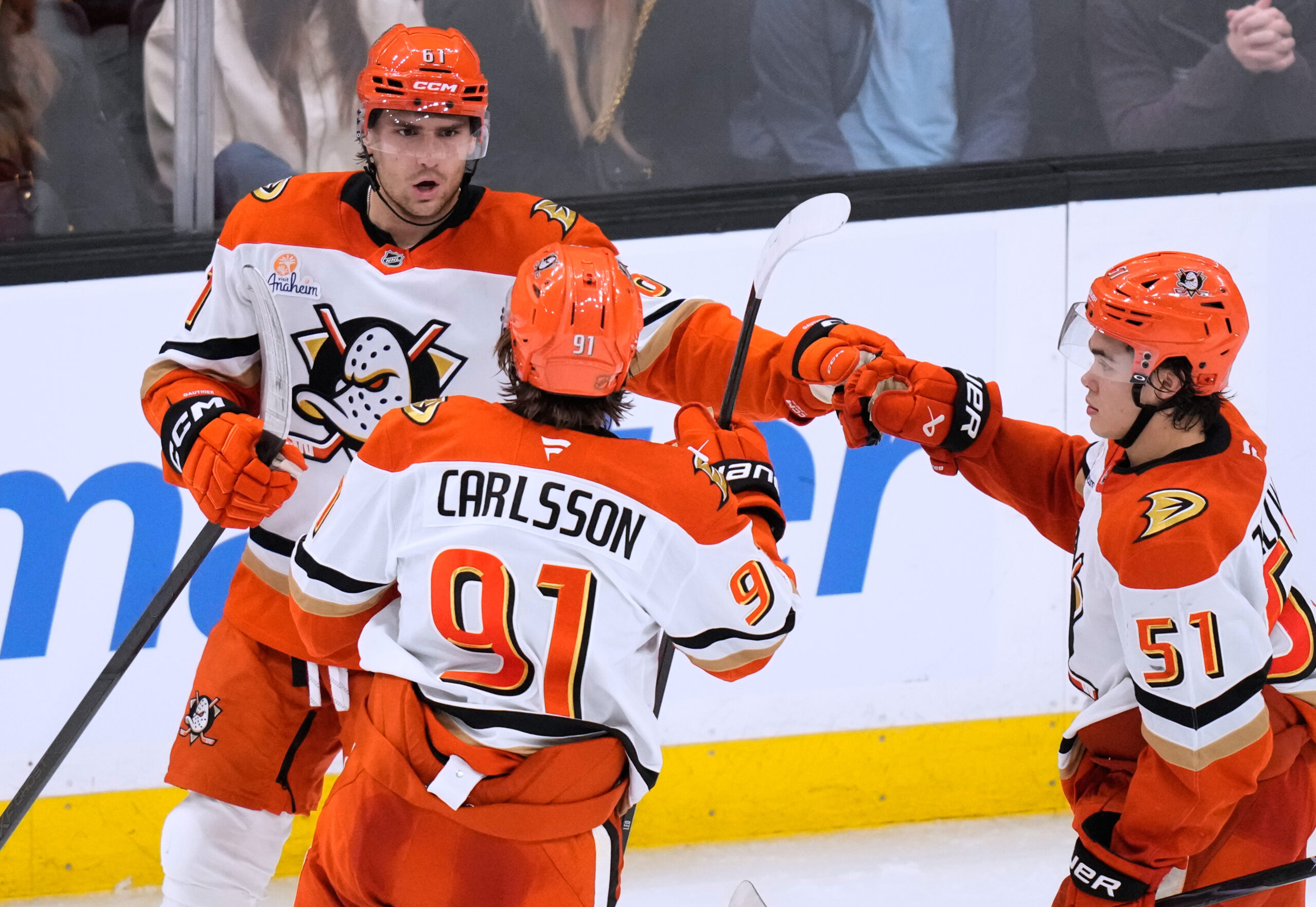 Ducks left wing Cutter Gauthier, left, is congratulated after his...