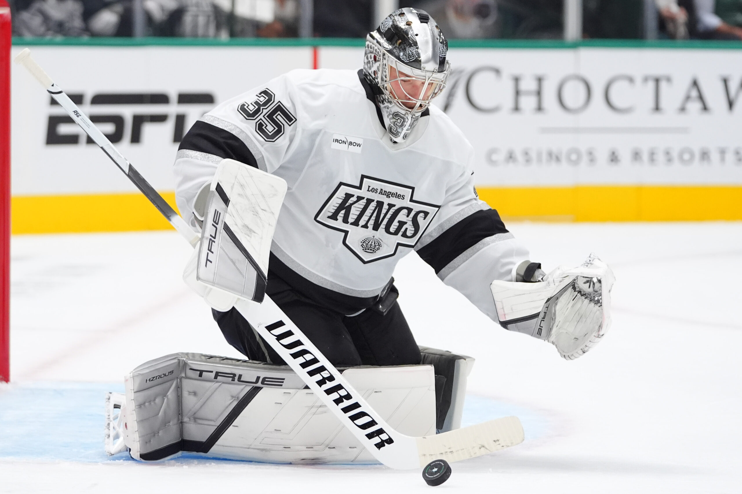 Kings goaltender Darcy Kuemper defends his net during the first...