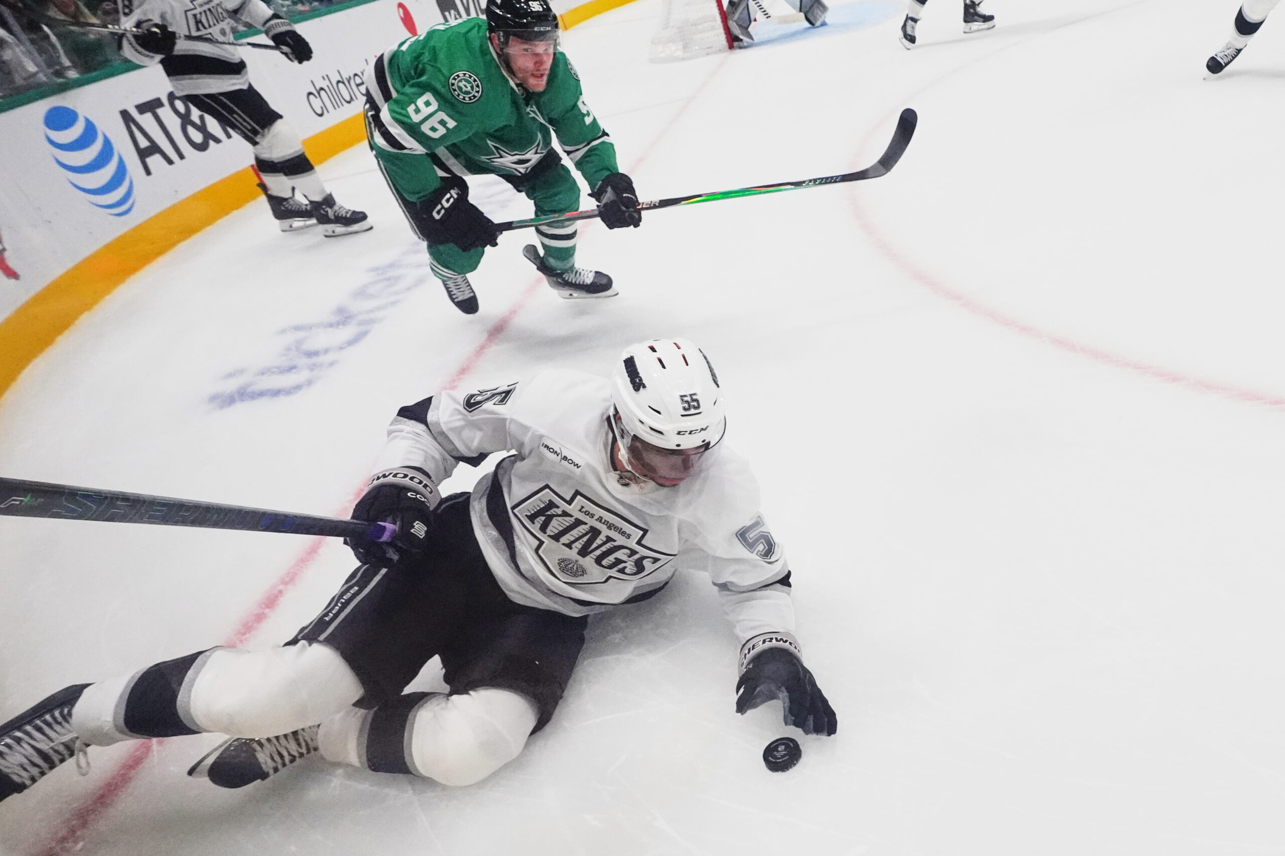 Kings right wing Quinton Byfield (55) reaches for the puck...