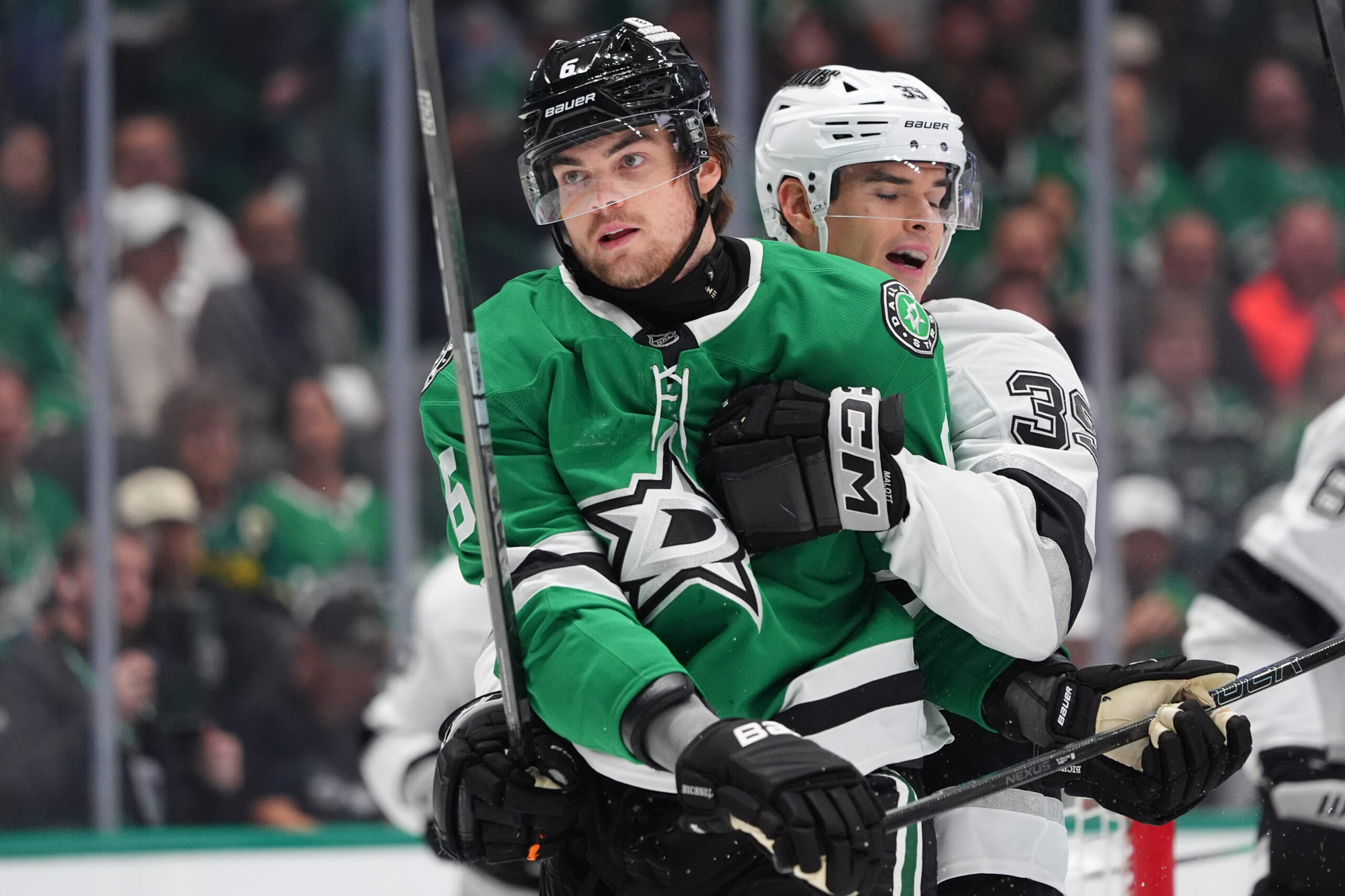 Kings left wing Jeff Malott (39) holds onto Dallas Stars...