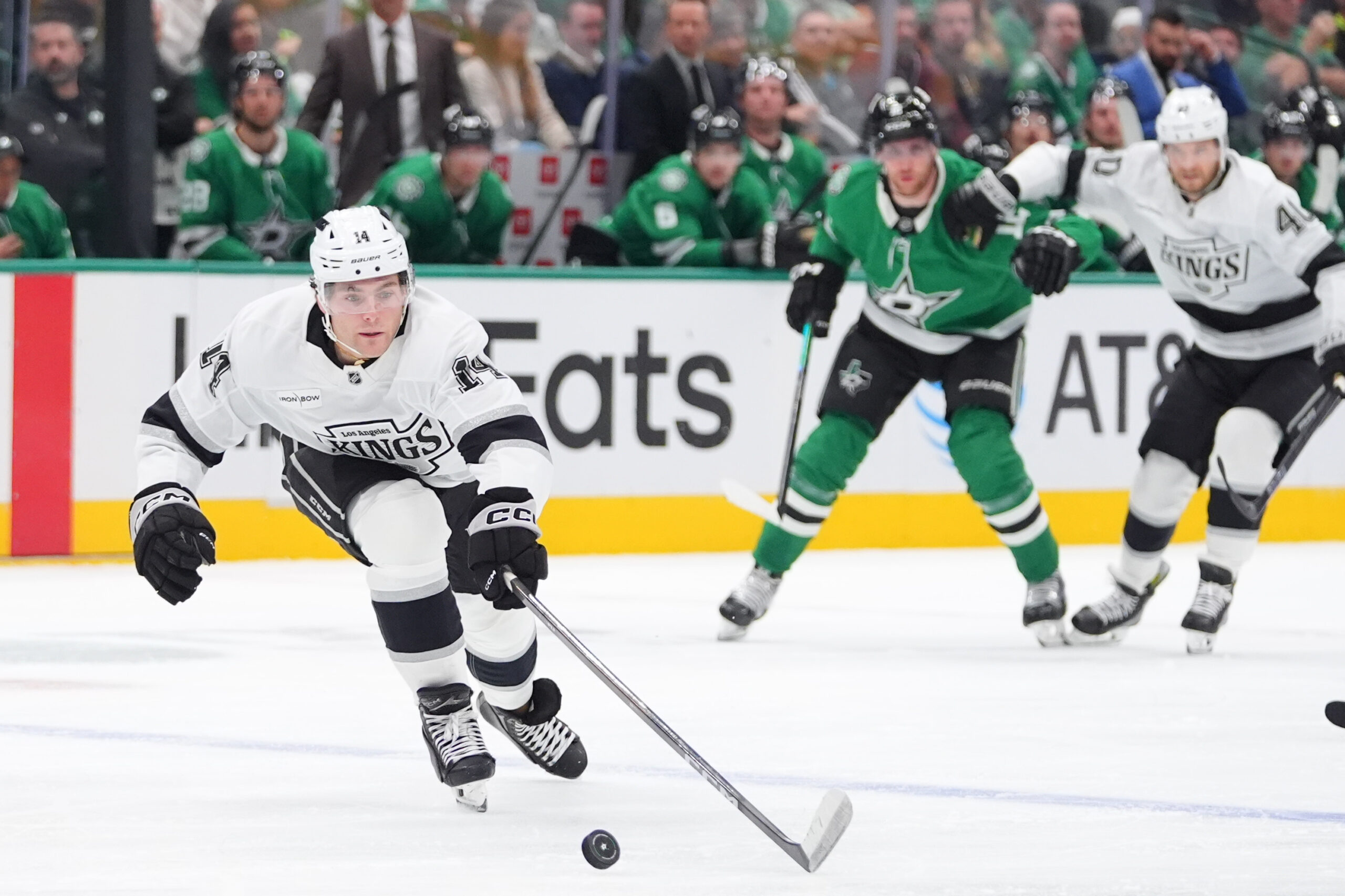 Kings right wing Alex Laferriere (14) chases the puck during...