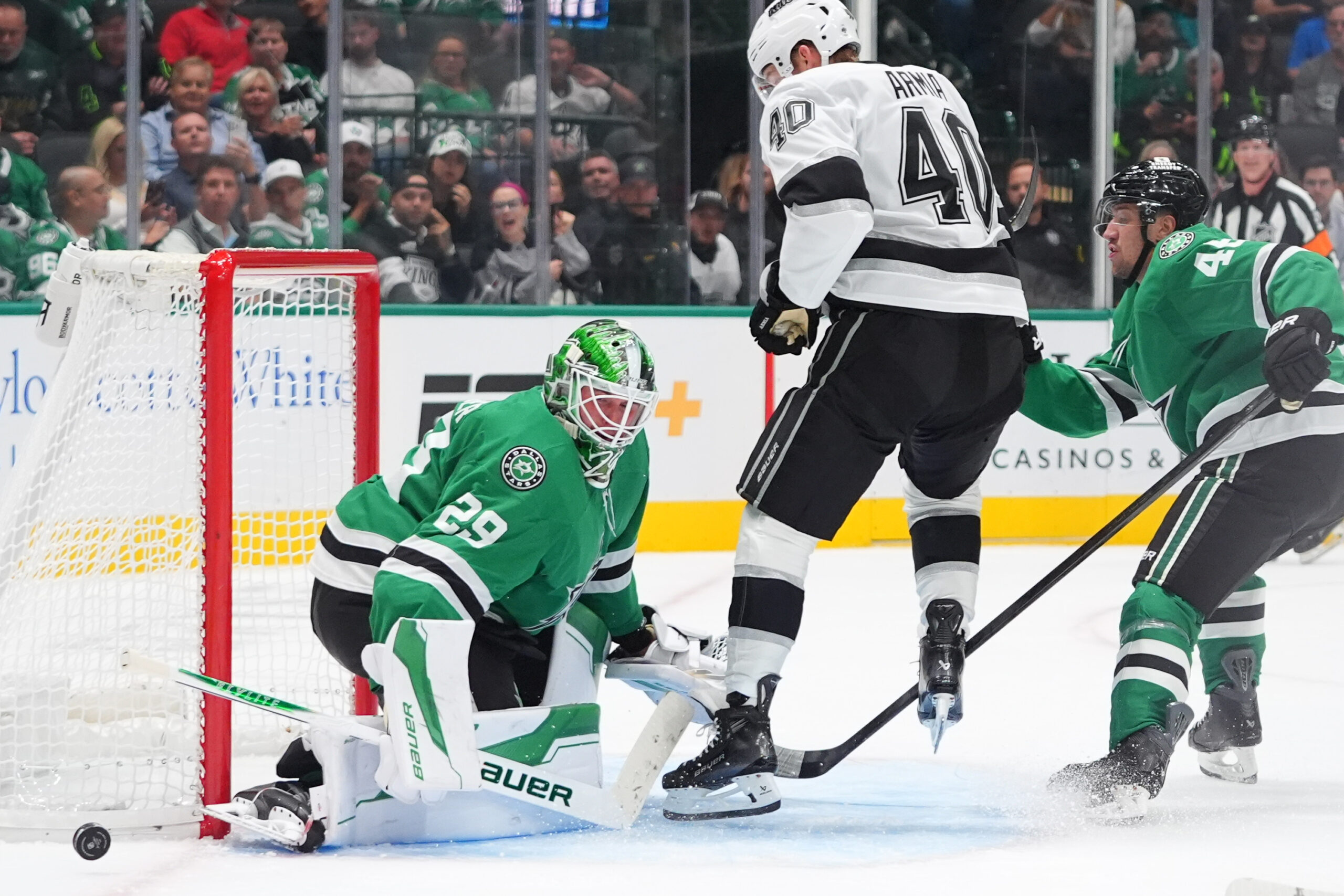 Dallas Stars goaltender Jake Oettinger (29) defends the goal against...