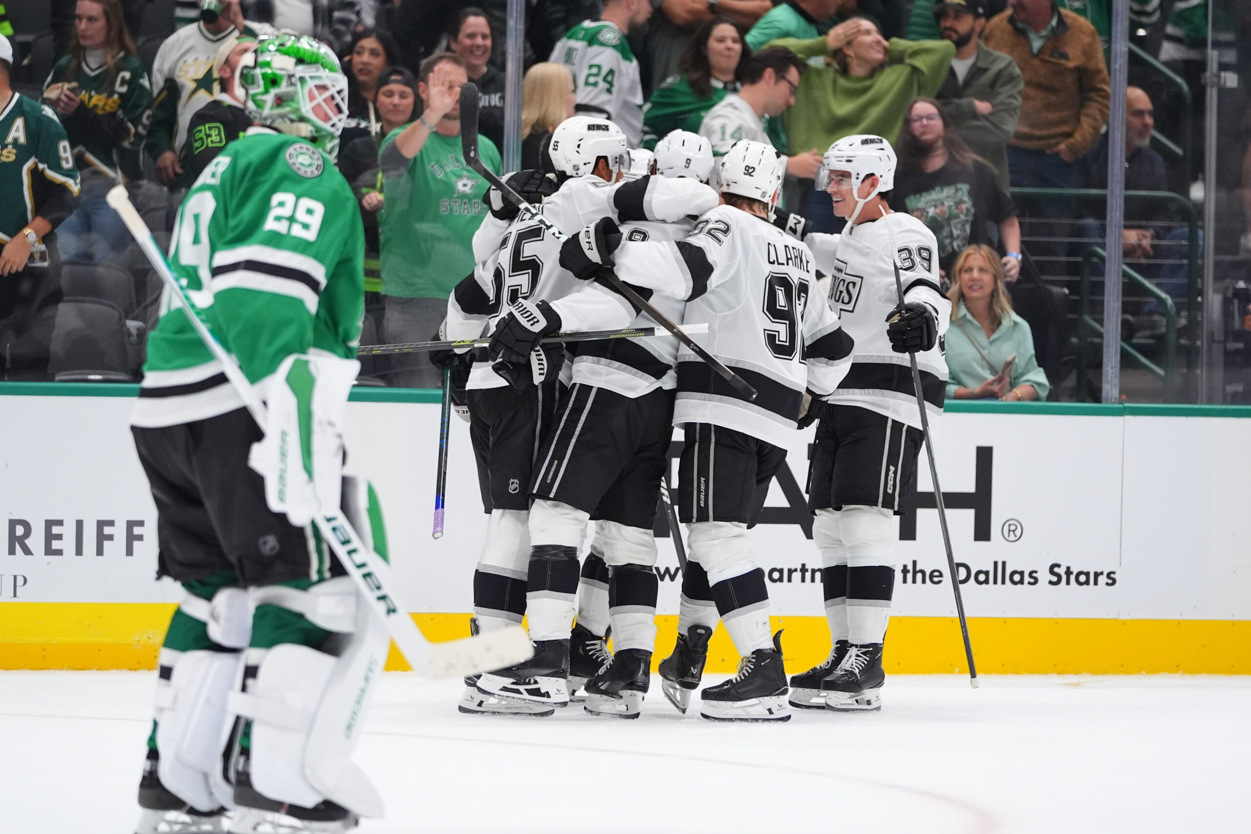 The Kings celebrate the winning goal by right wing Adrian...