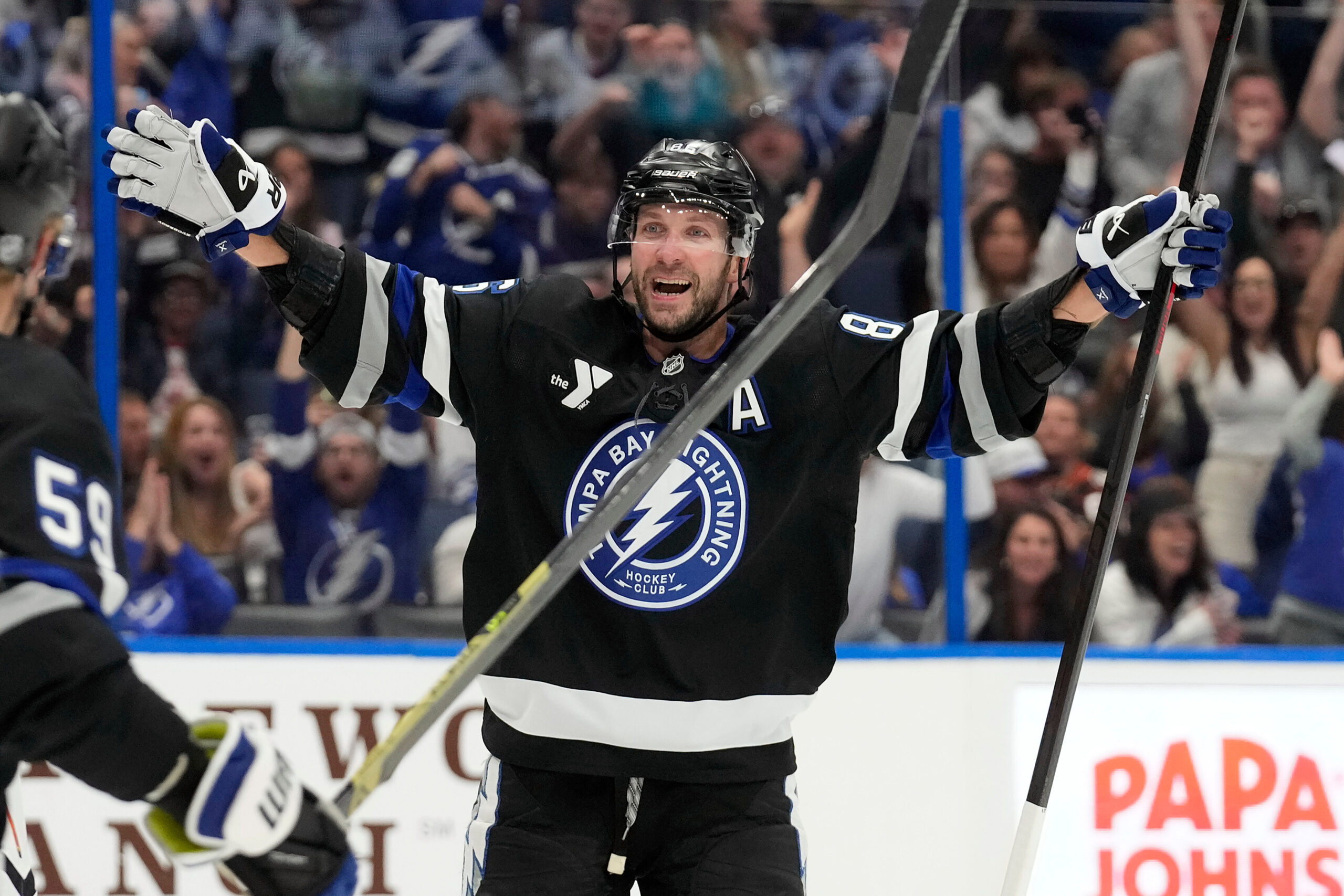 Tampa Bay Lightning right wing Nikita Kucherov (86) celebrates after...