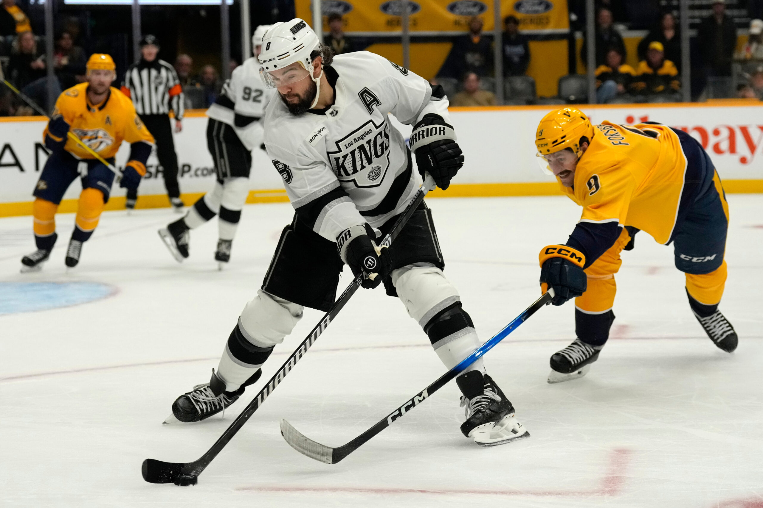 Nashville Predators left wing Filip Forsberg (9) tries to block...