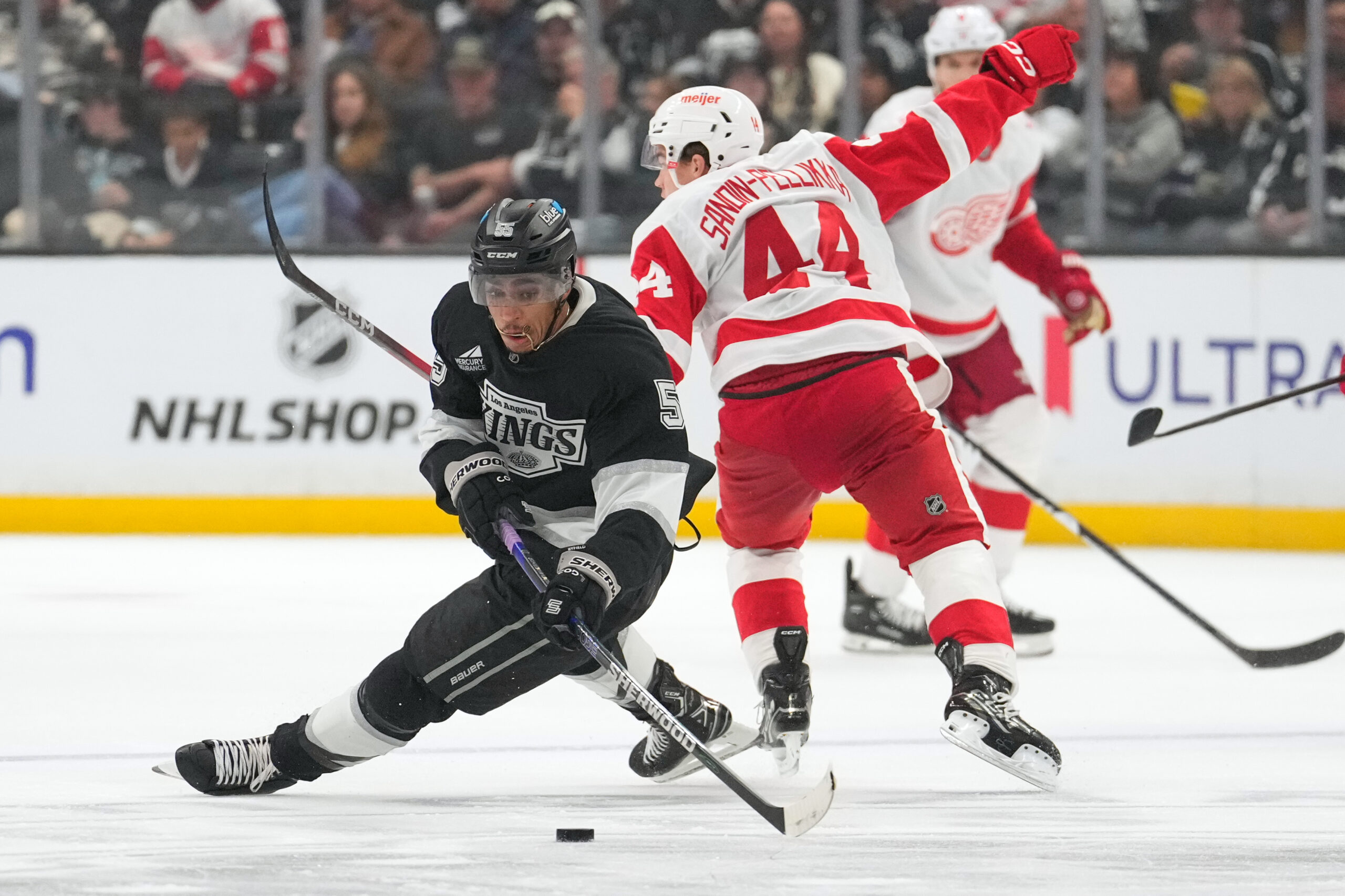 Kings right wing Quinton Byfield falls as the passes the...