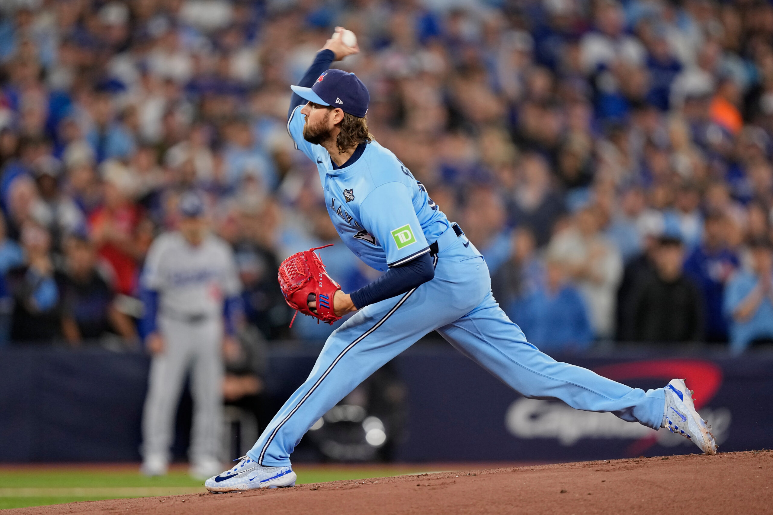 Toronto Blue Jays starting pitcher Kevin Gausman throws to the...