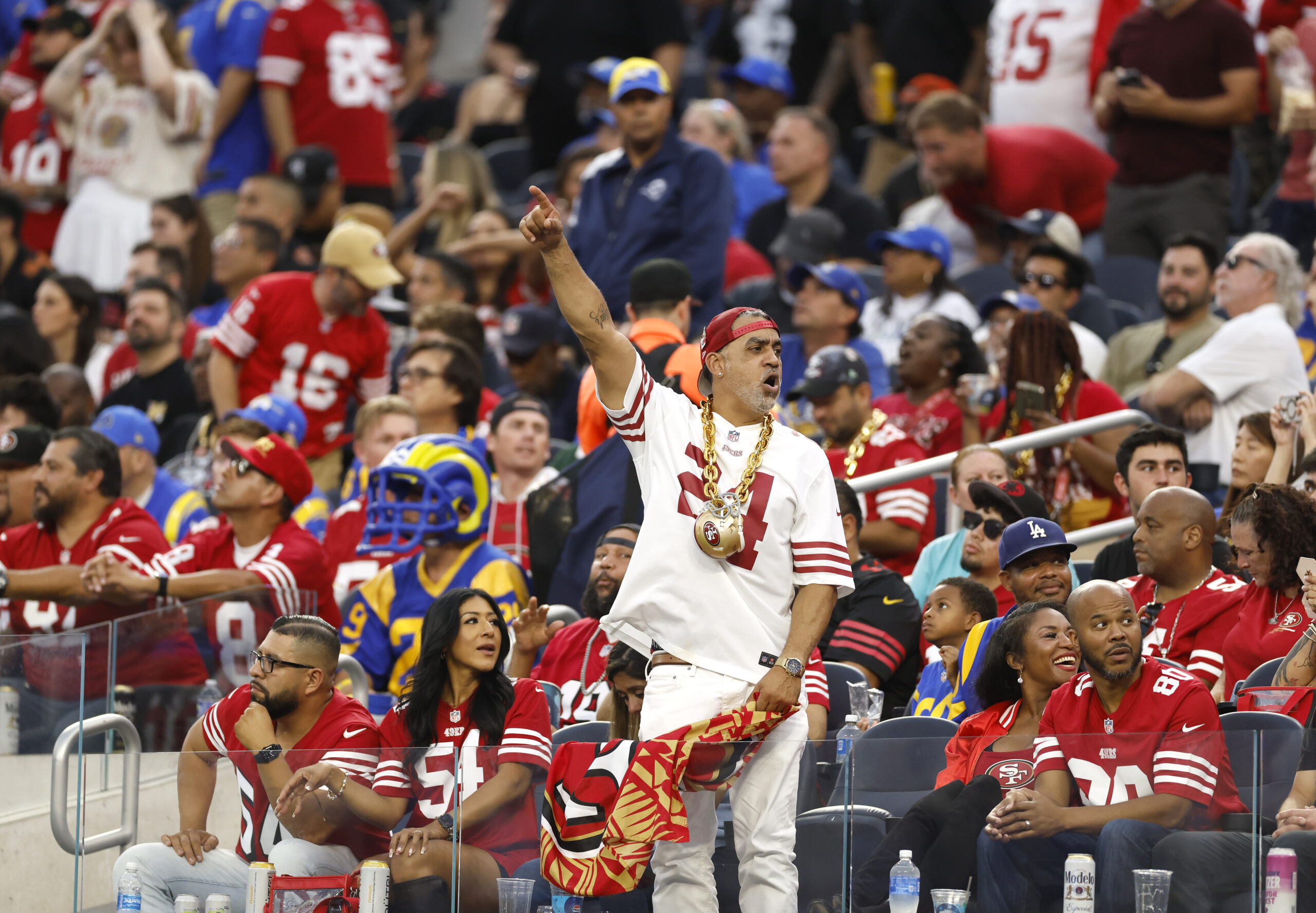 San Francisco 49ers fans cheer during the first half against...