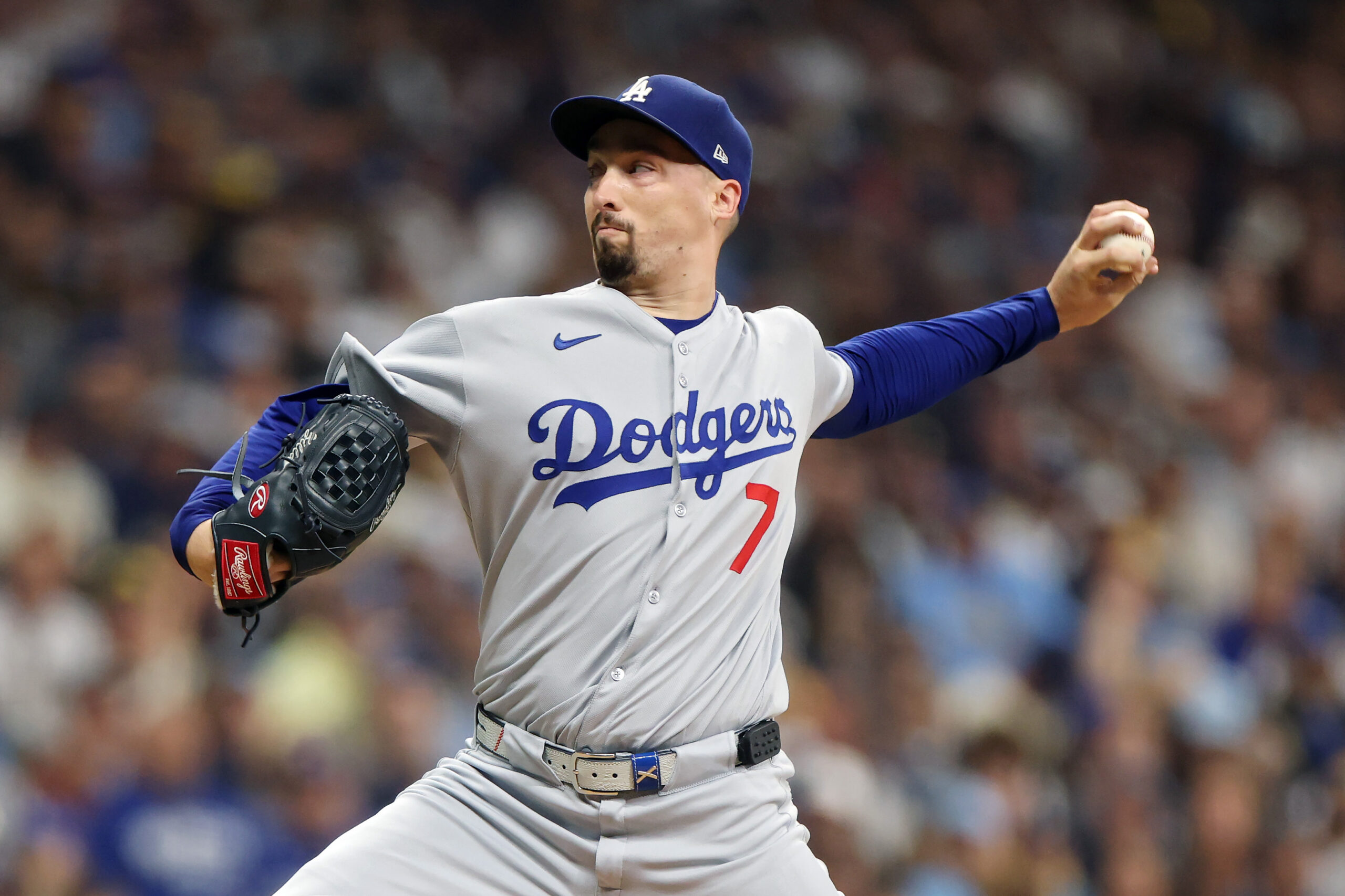 Dodgers starting pitcher Blake Snell throws to the plate during...