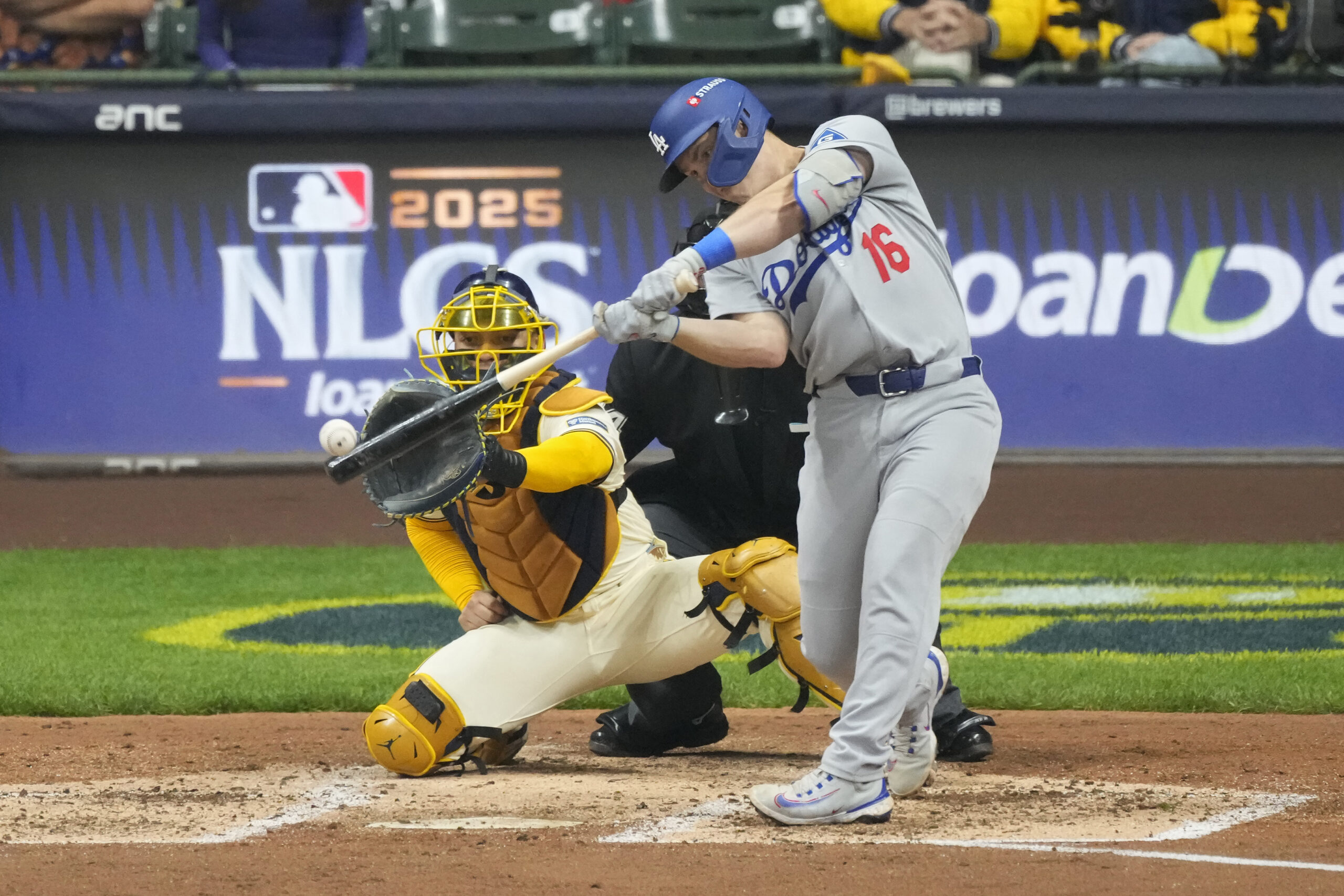 The Dodgers’ Will Smith hits a single during the fourth...