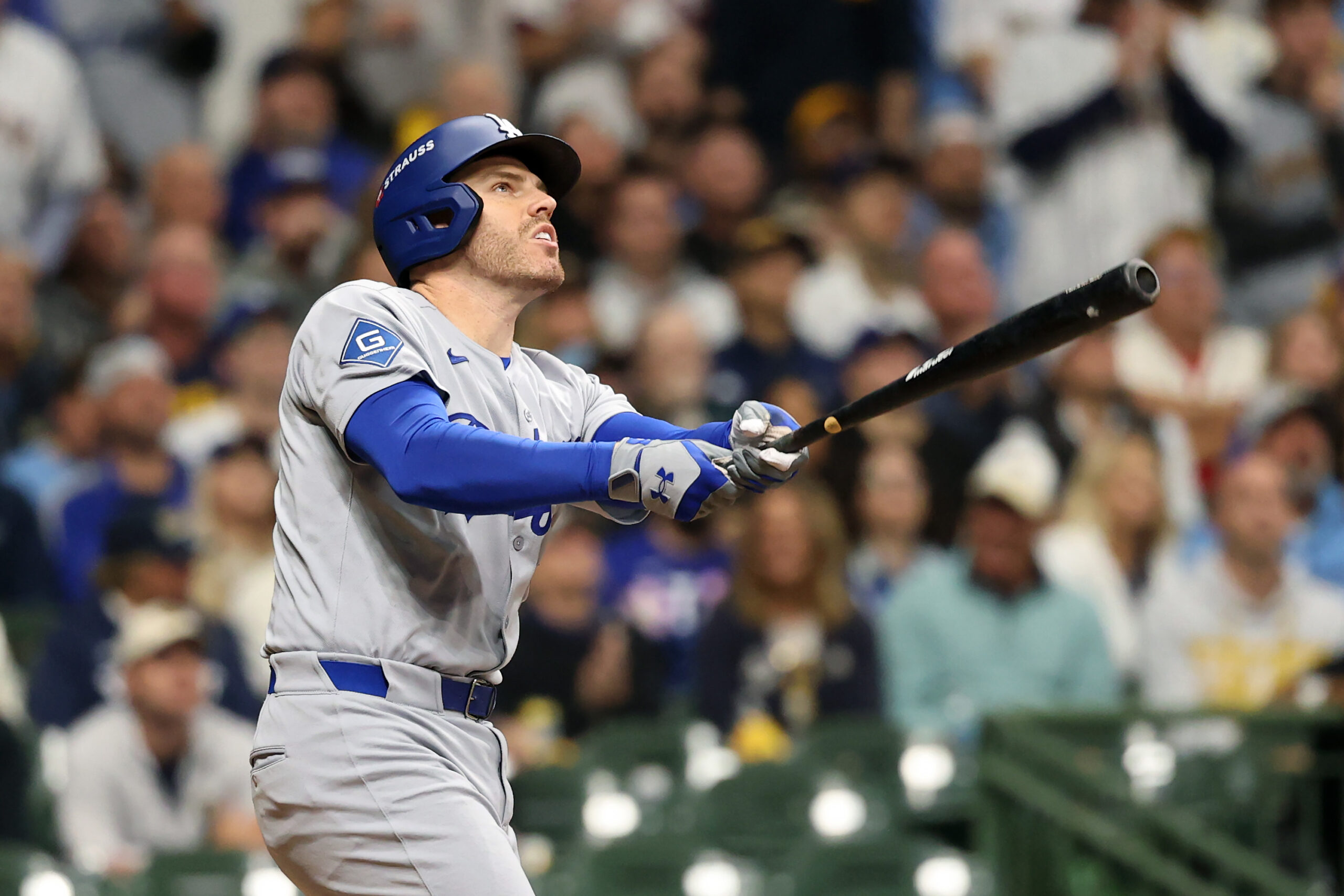 The Dodgers’ Freddie Freeman hits a solo home run during...