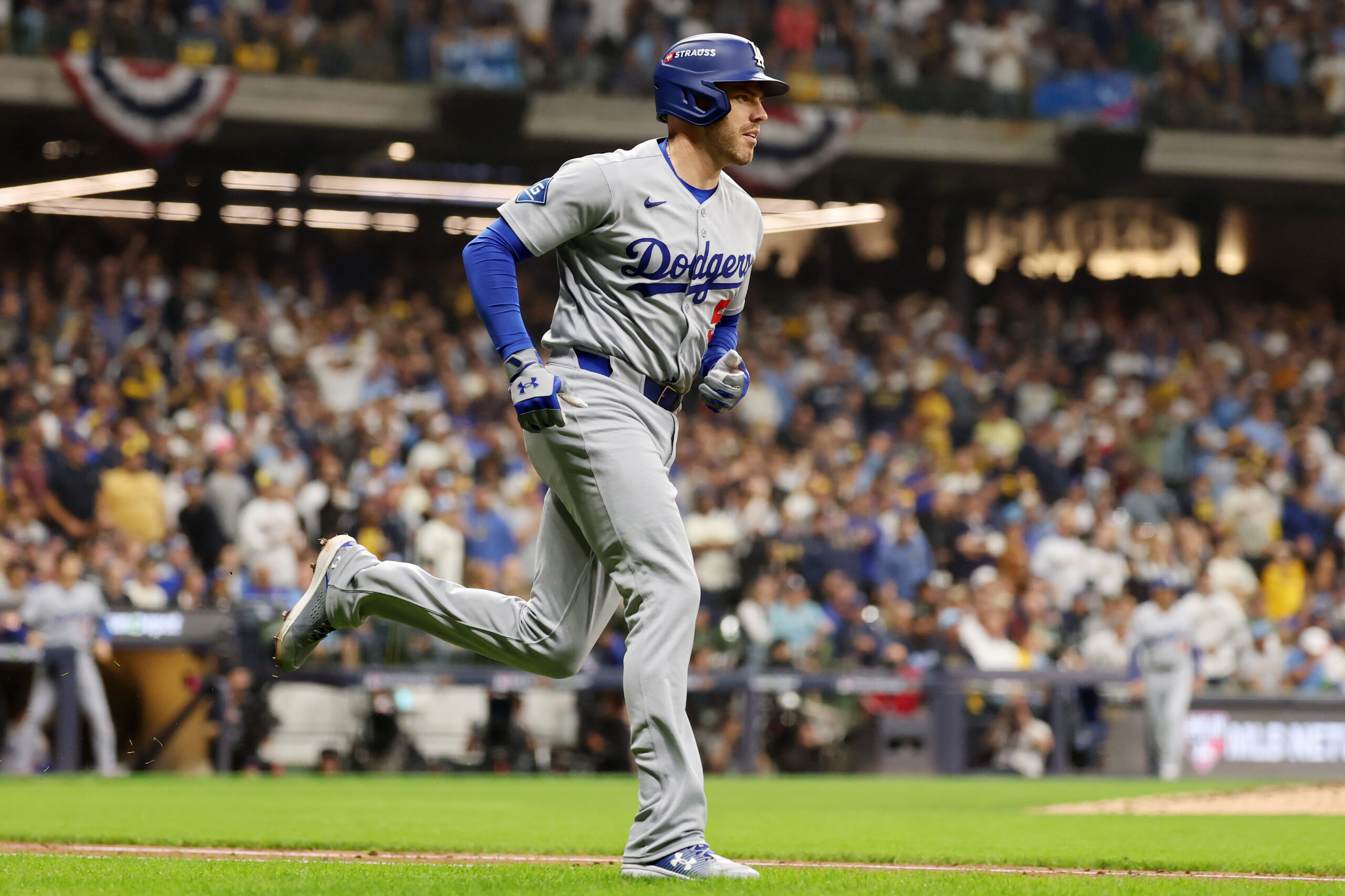 The Dodgers’ Freddie Freeman begins to run the bases after...