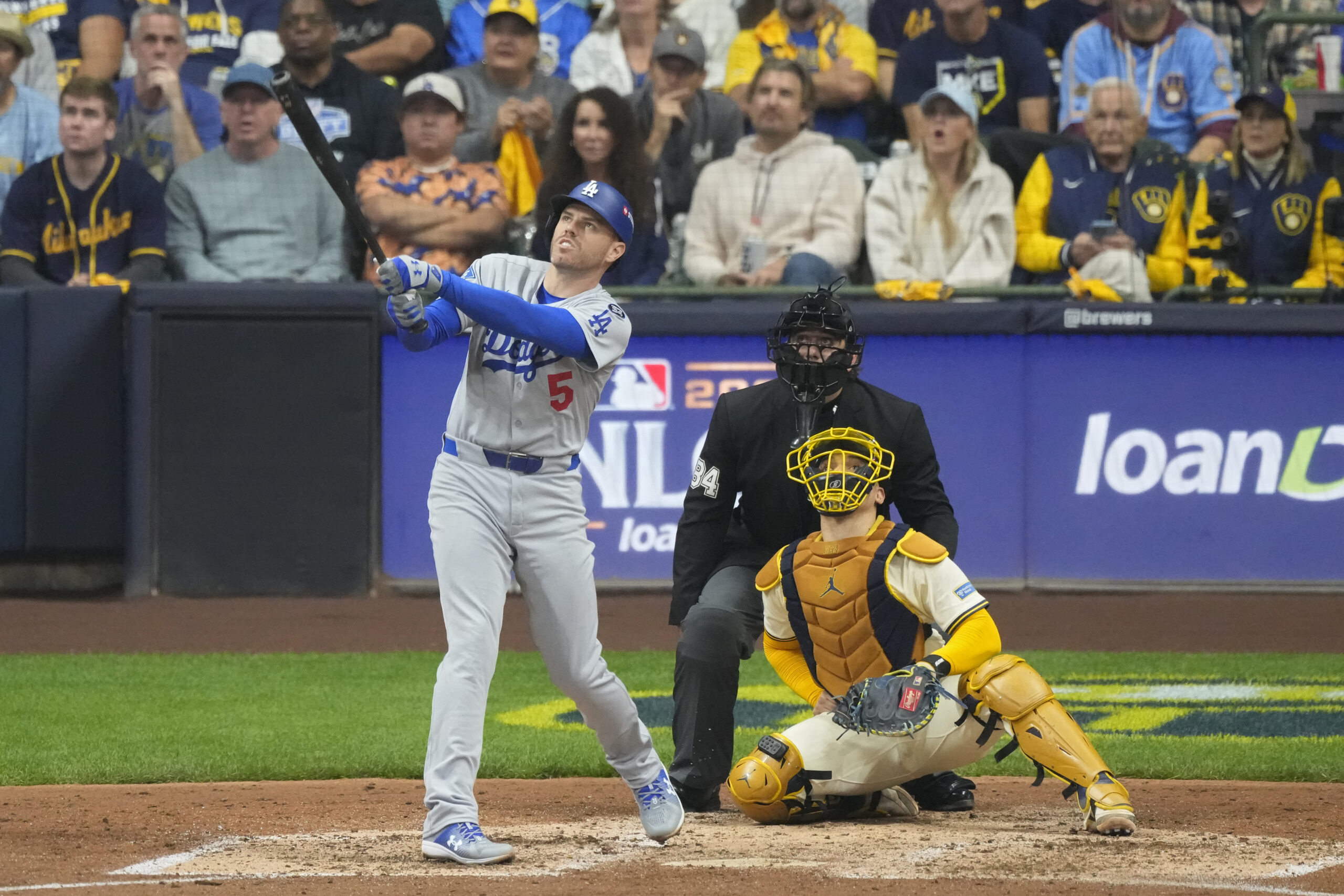 The Dodgers’ Freddie Freeman hits a solo home run during...