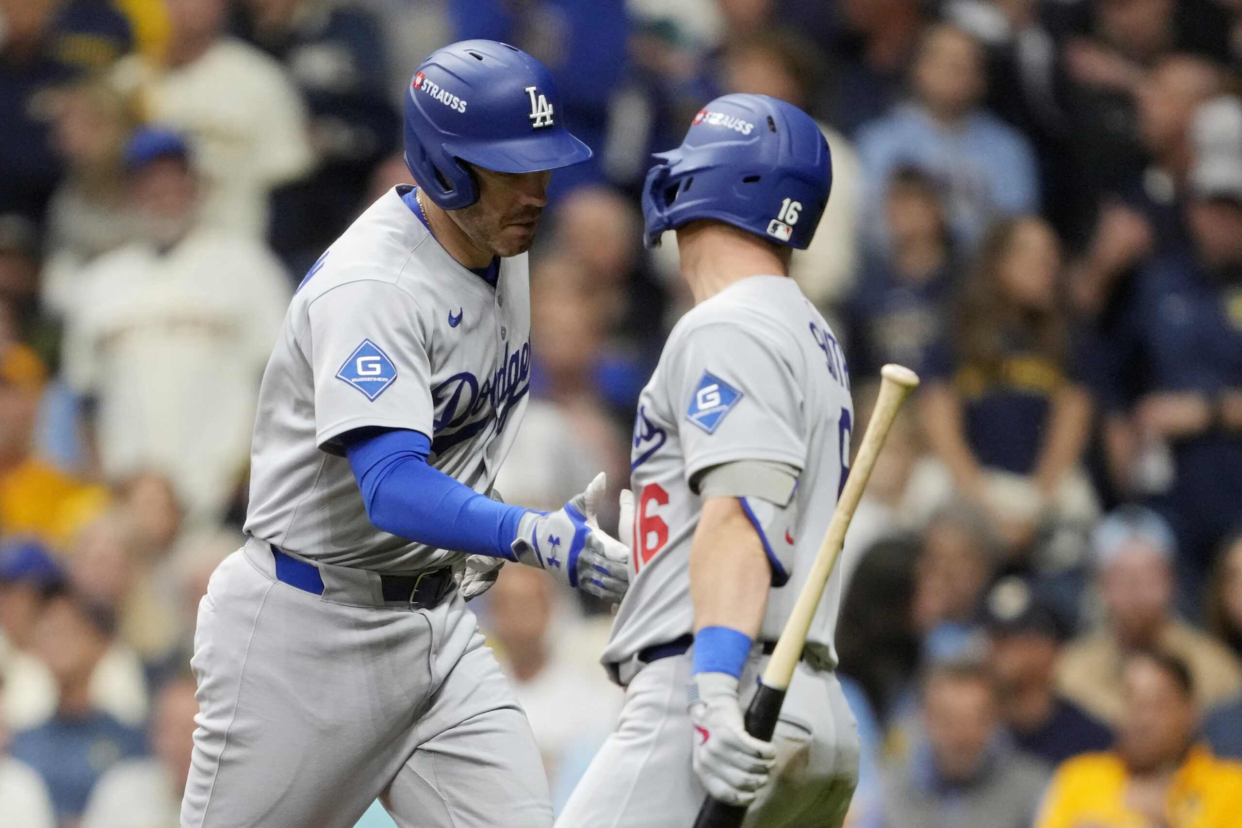 The Dodgers’ Freddie Freeman, left, celebrates with teammate Will Smith...