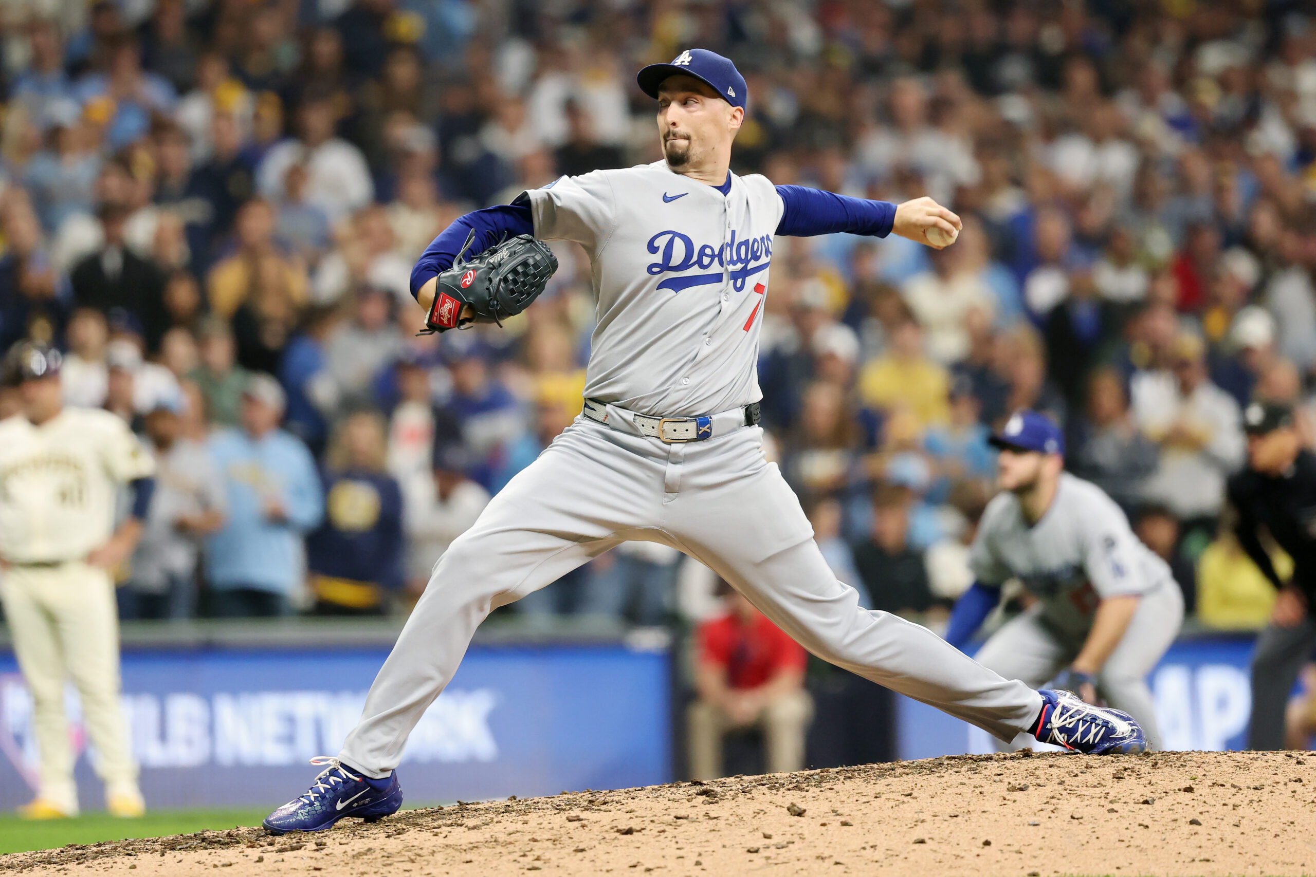 Dodgers starting pitcher Blake Snell throws to the plate during...