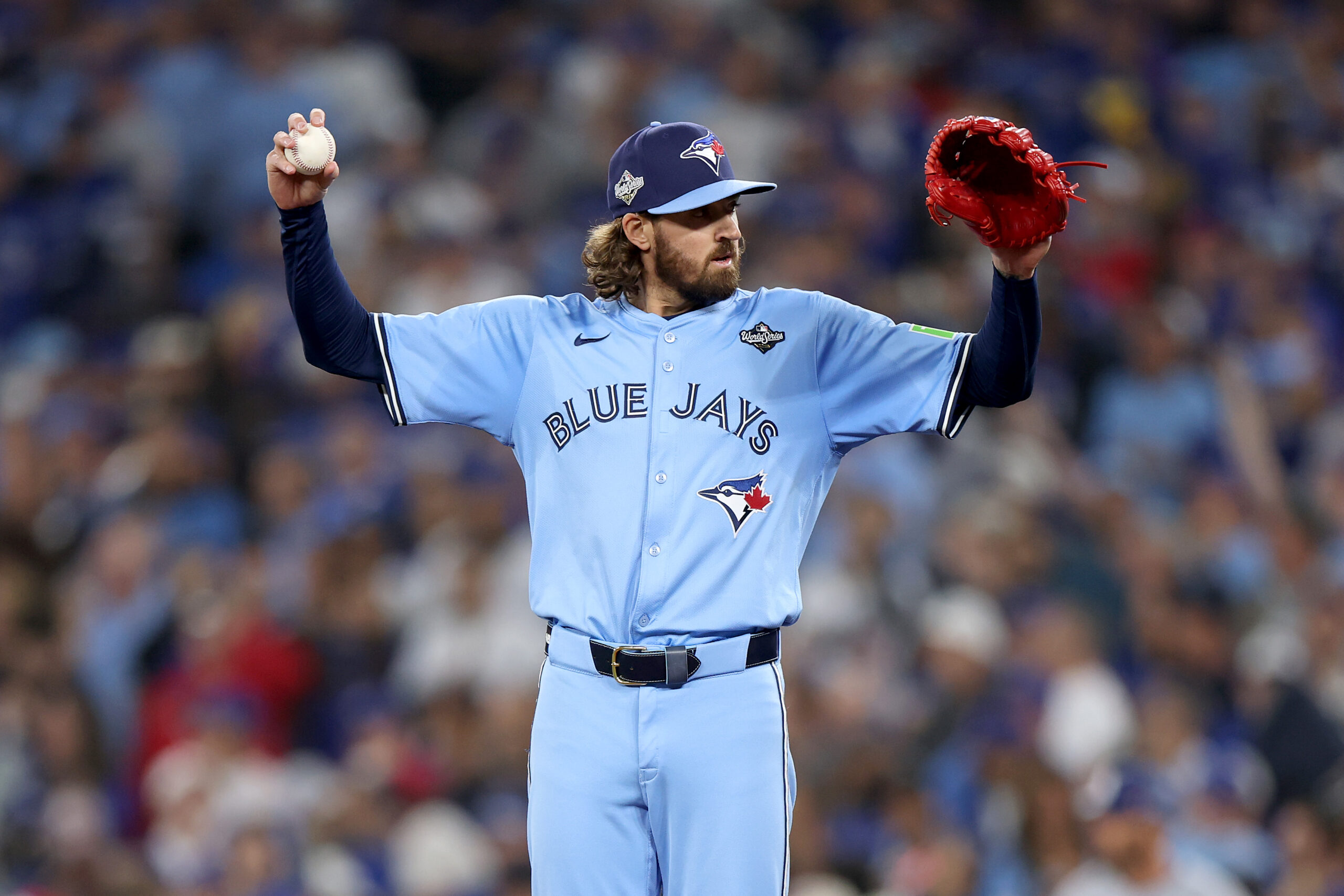 Toronto Blue Jays starting pitcher Kevin Gausman prepares to throw...