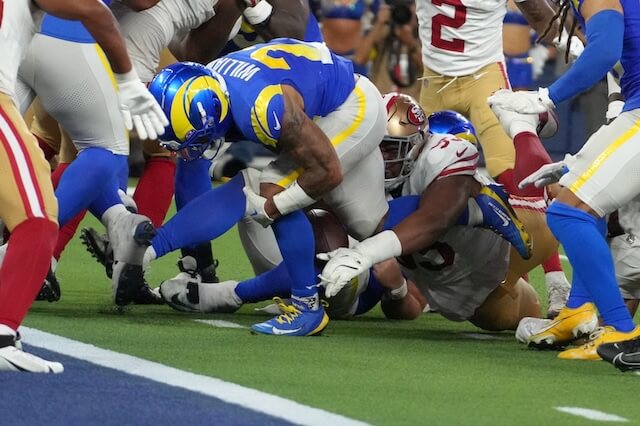 Oct 2, 2025; Inglewood, California, USA; San Francisco 49ers defensive tackle Alfred Collins (95) forces a fumble by Los Angeles Rams running back Kyren Williams (23) at the 1-yard line in the fourth quarter at SoFi Stadium. Mandatory Credit: Kirby Lee-Imagn Images Kyren Williams, Rams, 49ers