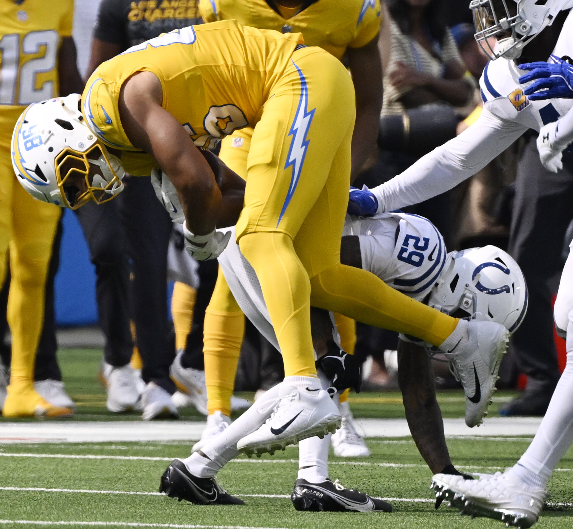 Tight end Oronde Gadsden II #86 of the Chargers catches...