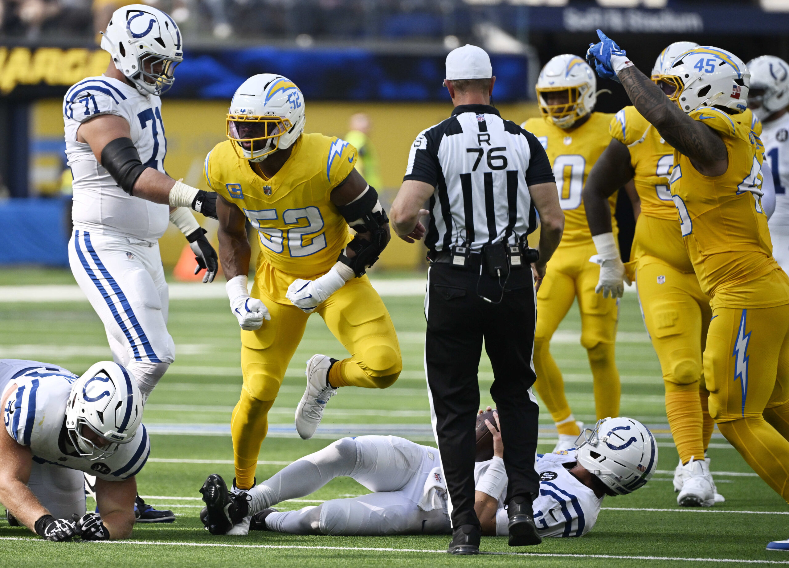 Outside linebacker Khalil Mack #52 of the Chargers rects after...