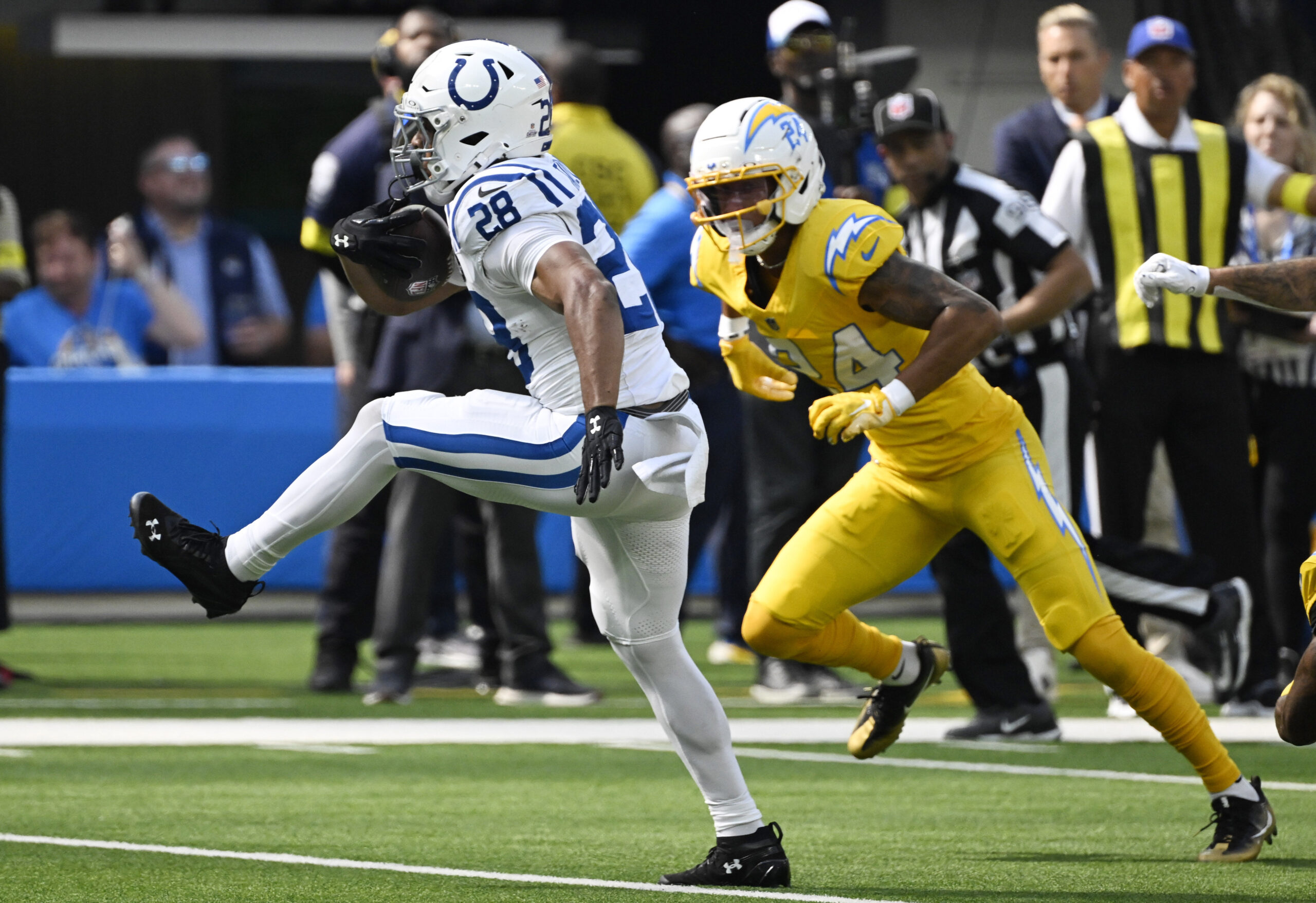 Running back Jonathan Taylor #28 of the Indianapolis Colts runs...