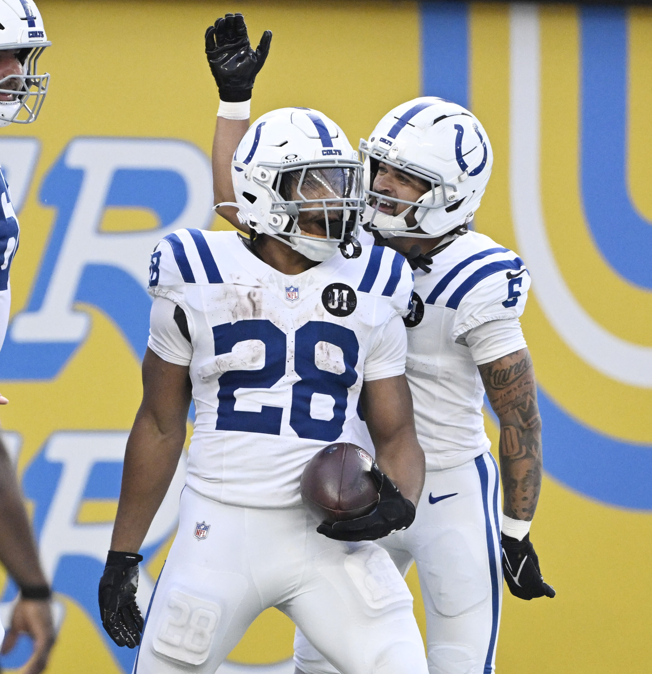 Running back Jonathan Taylor #28 of the Indianapolis Colts celebrate...