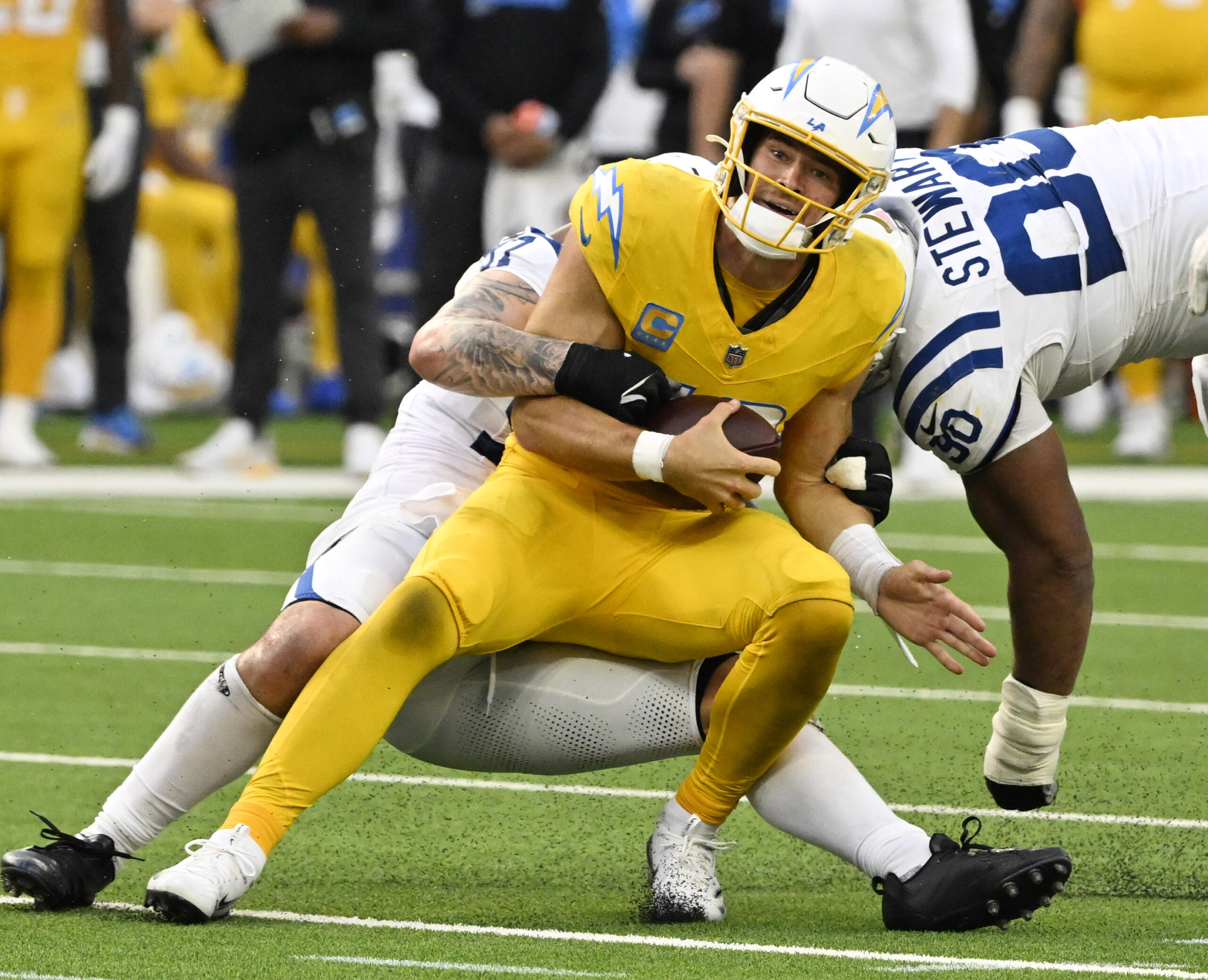 Defensive end Laiatu Latu #97 of the Indianapolis Colts tackles...