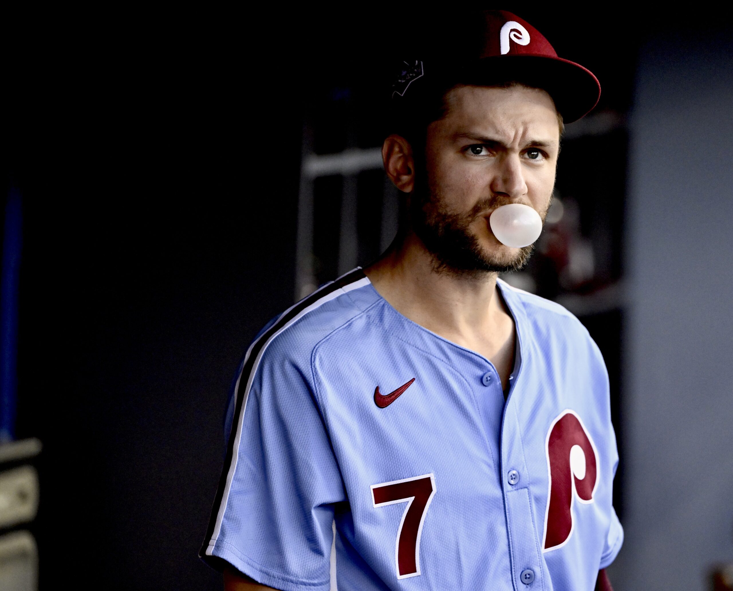 Trea Turner #7 of the Philadelphia Phillies blows a bubble...