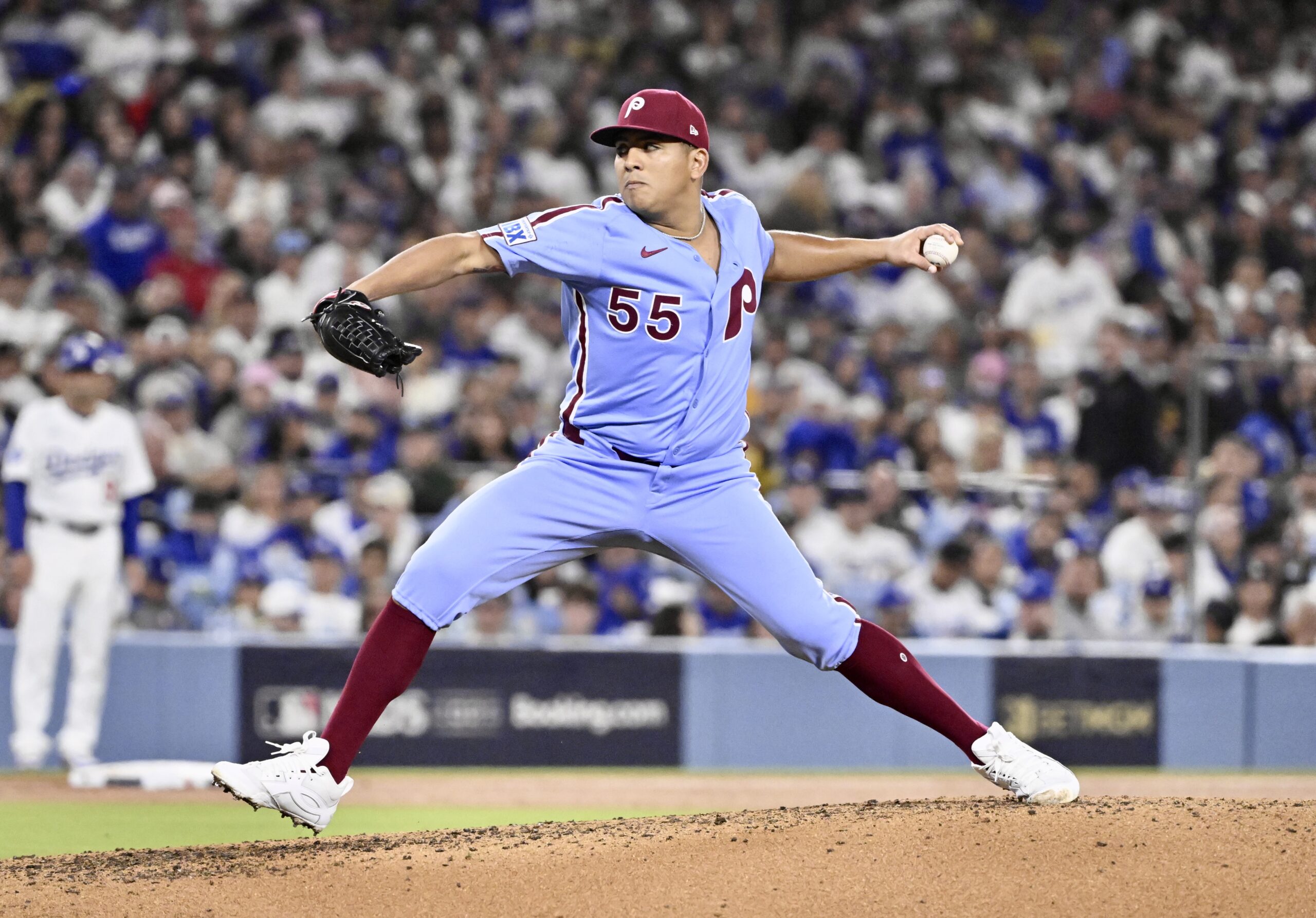 Philadelphia Phillies relief pitcher Ranger Suarez throws to the plate...