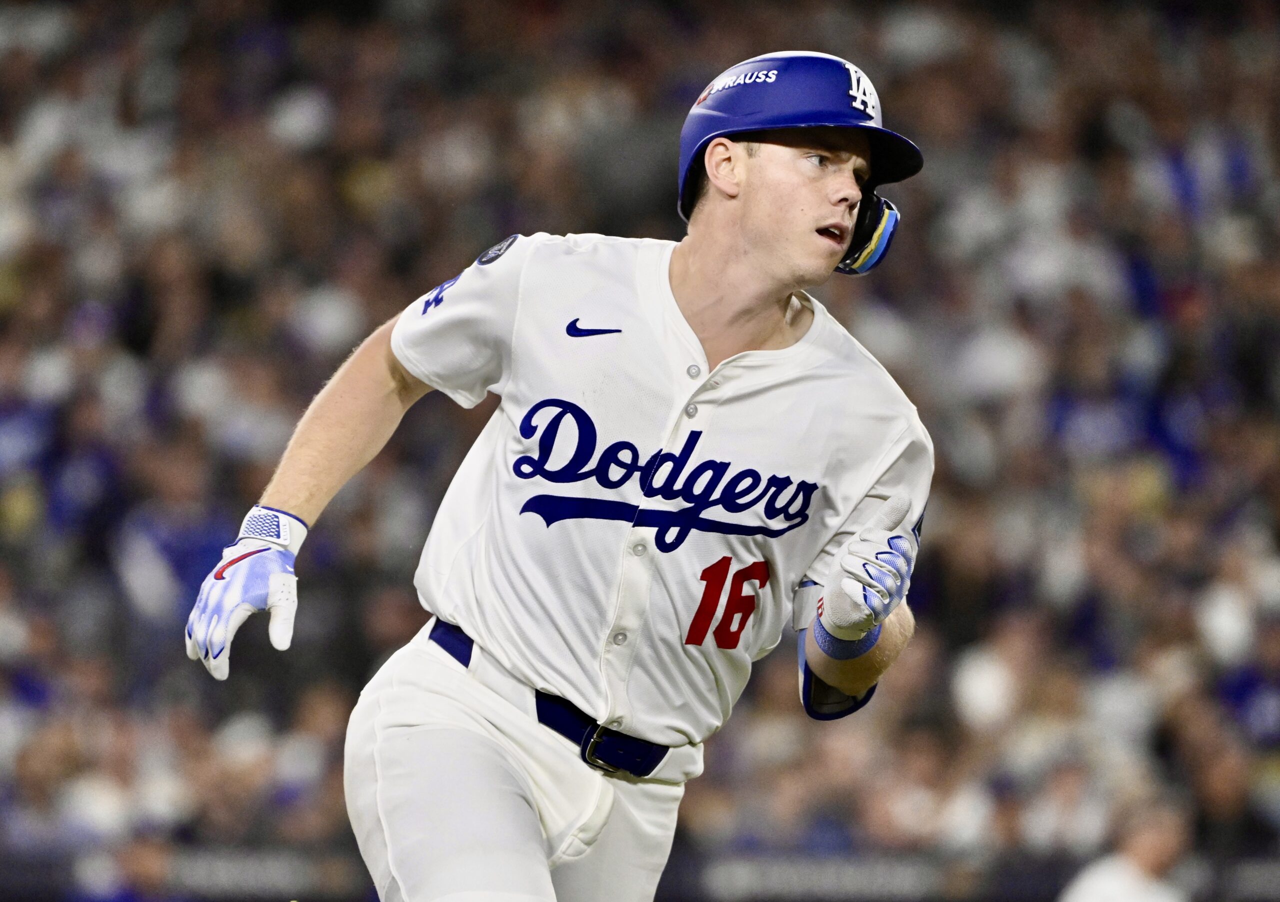 Will Smith #16 of the Los Angeles Dodgers singles against...