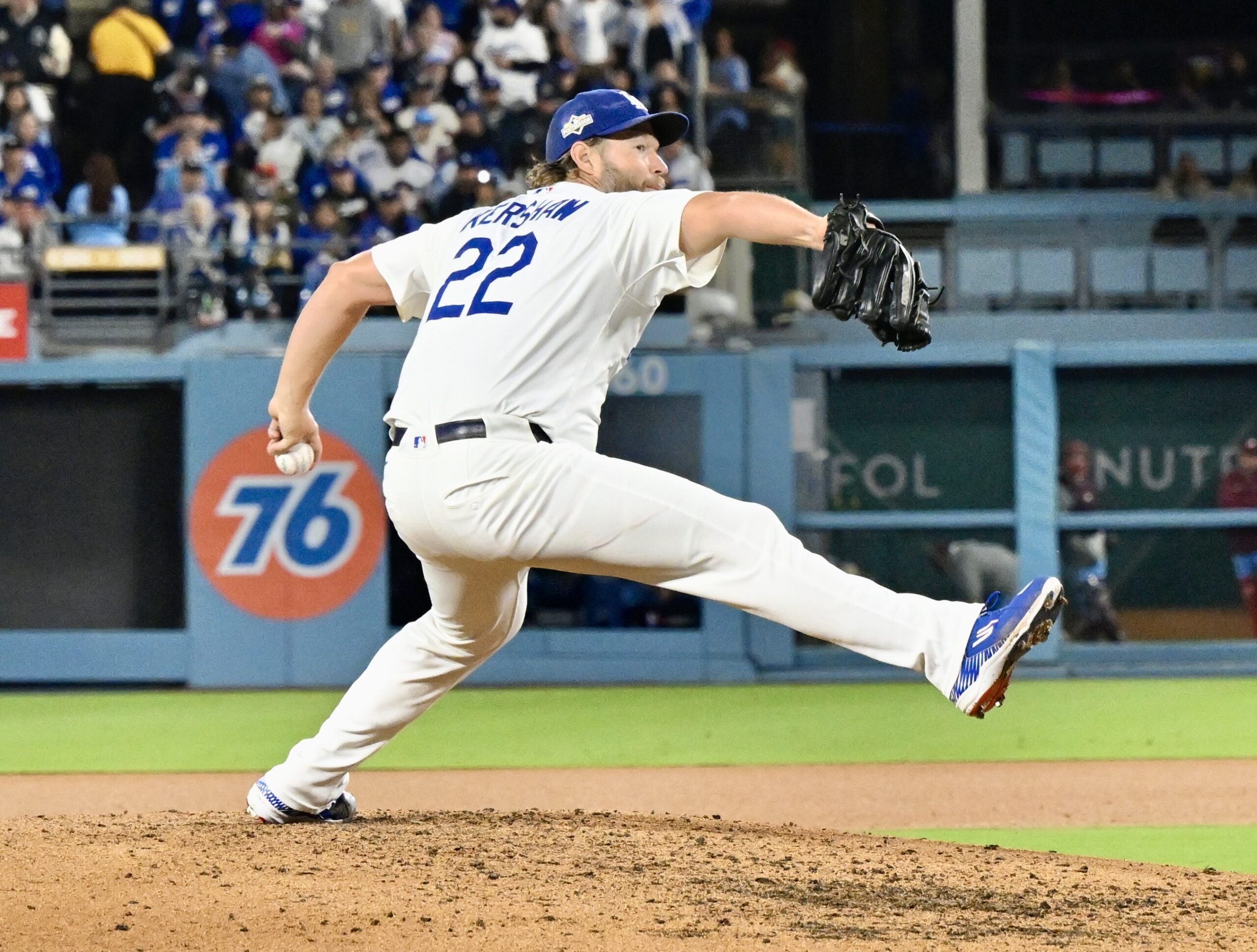 Dodgers relief pitcher Clayton Kershaw throws to the plate during...