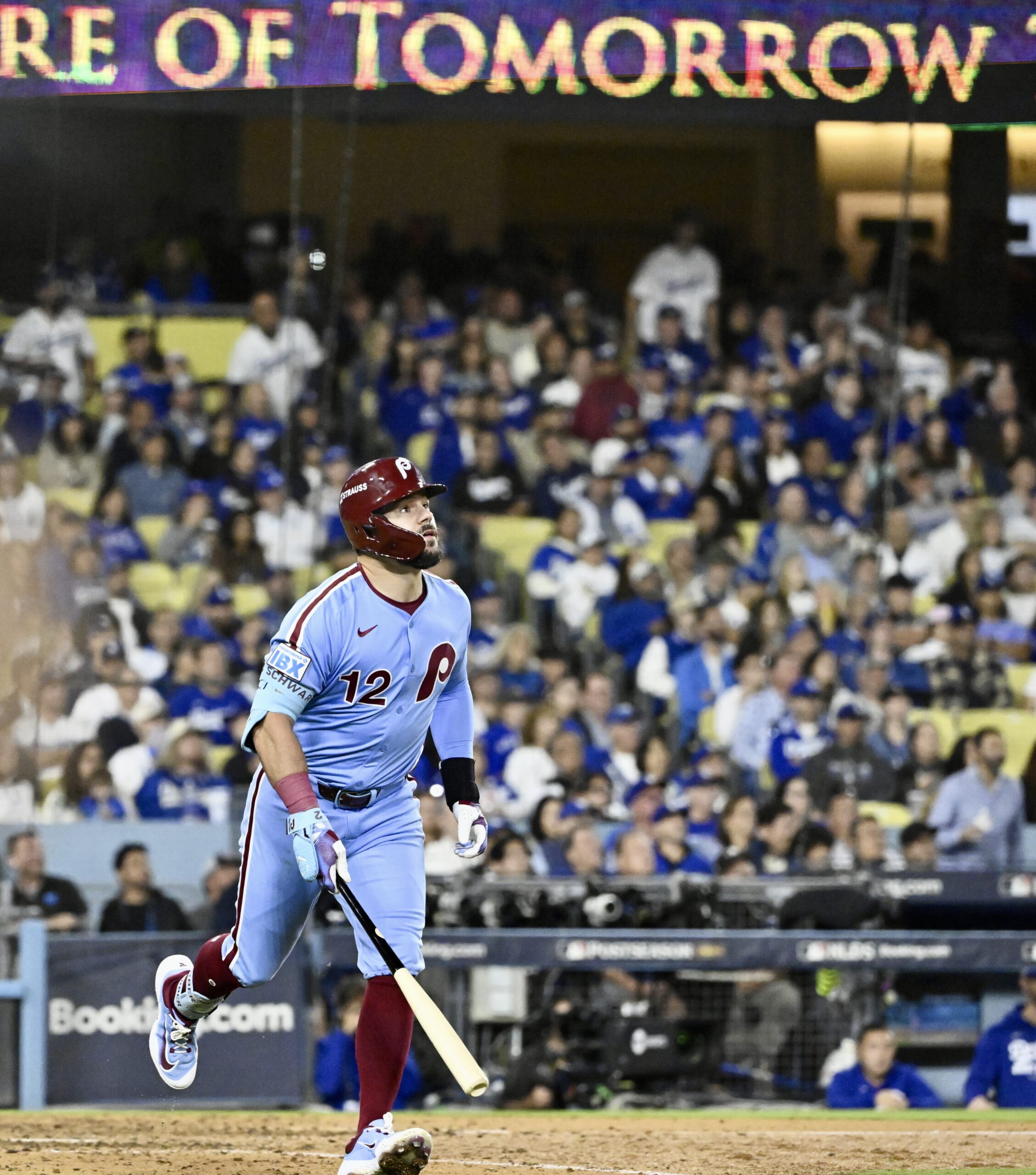 Philadelphia Phillies slugger Kyle Schwarber watches his two-run home run...