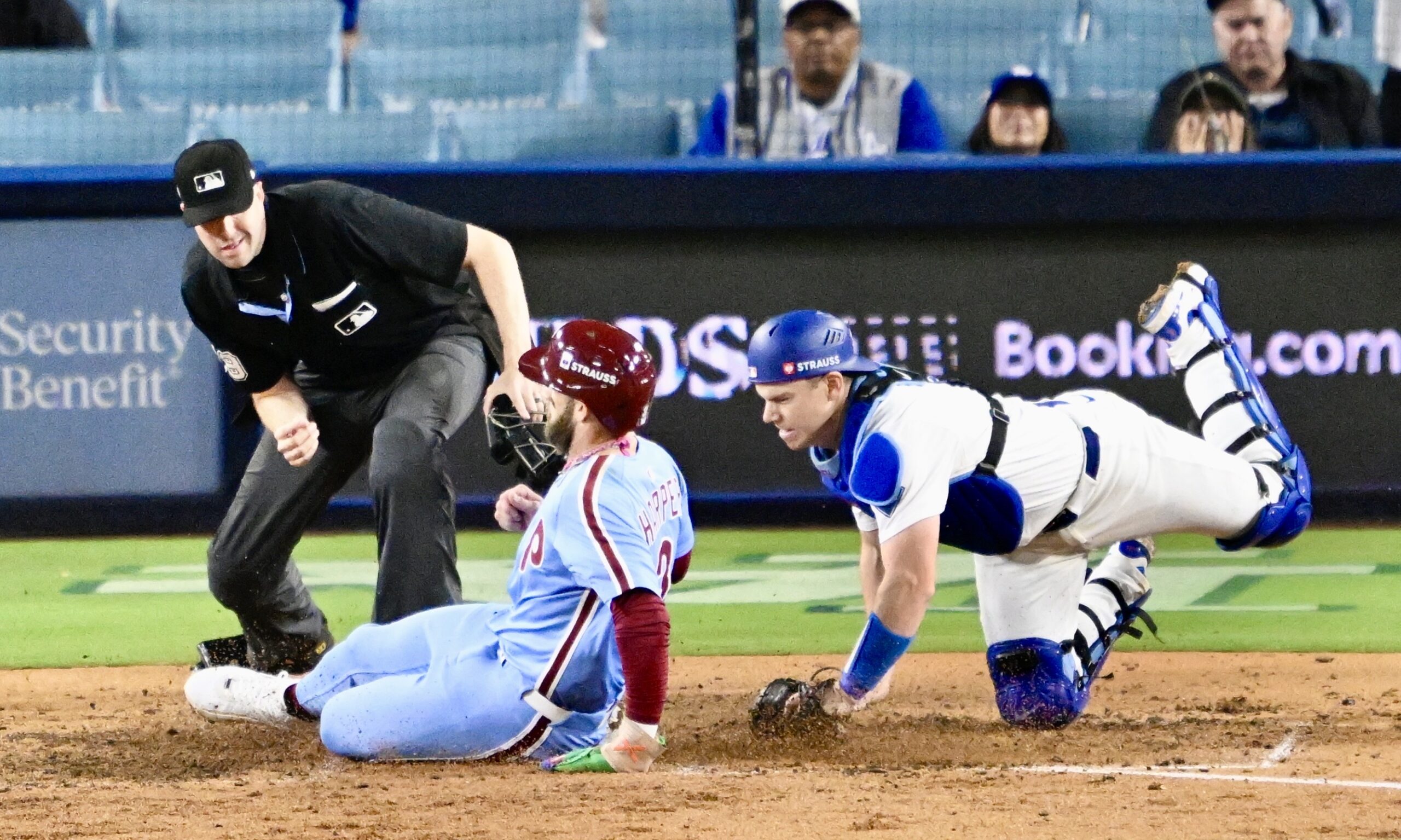 Dodgers catcher Will Smith tags out the Philadelphia Phillies’ Bryce...