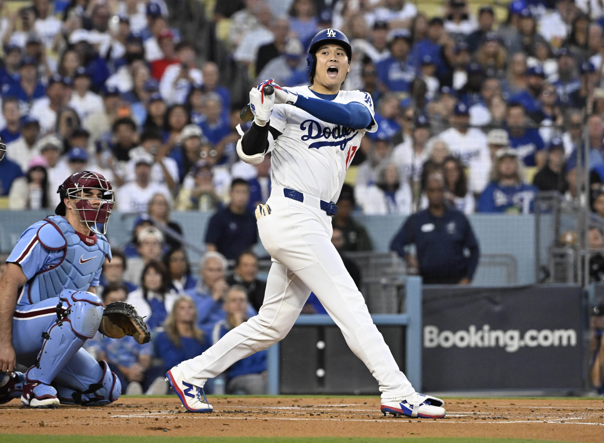 Dodgers star Shohei Ohtani reacts on a swing during the...