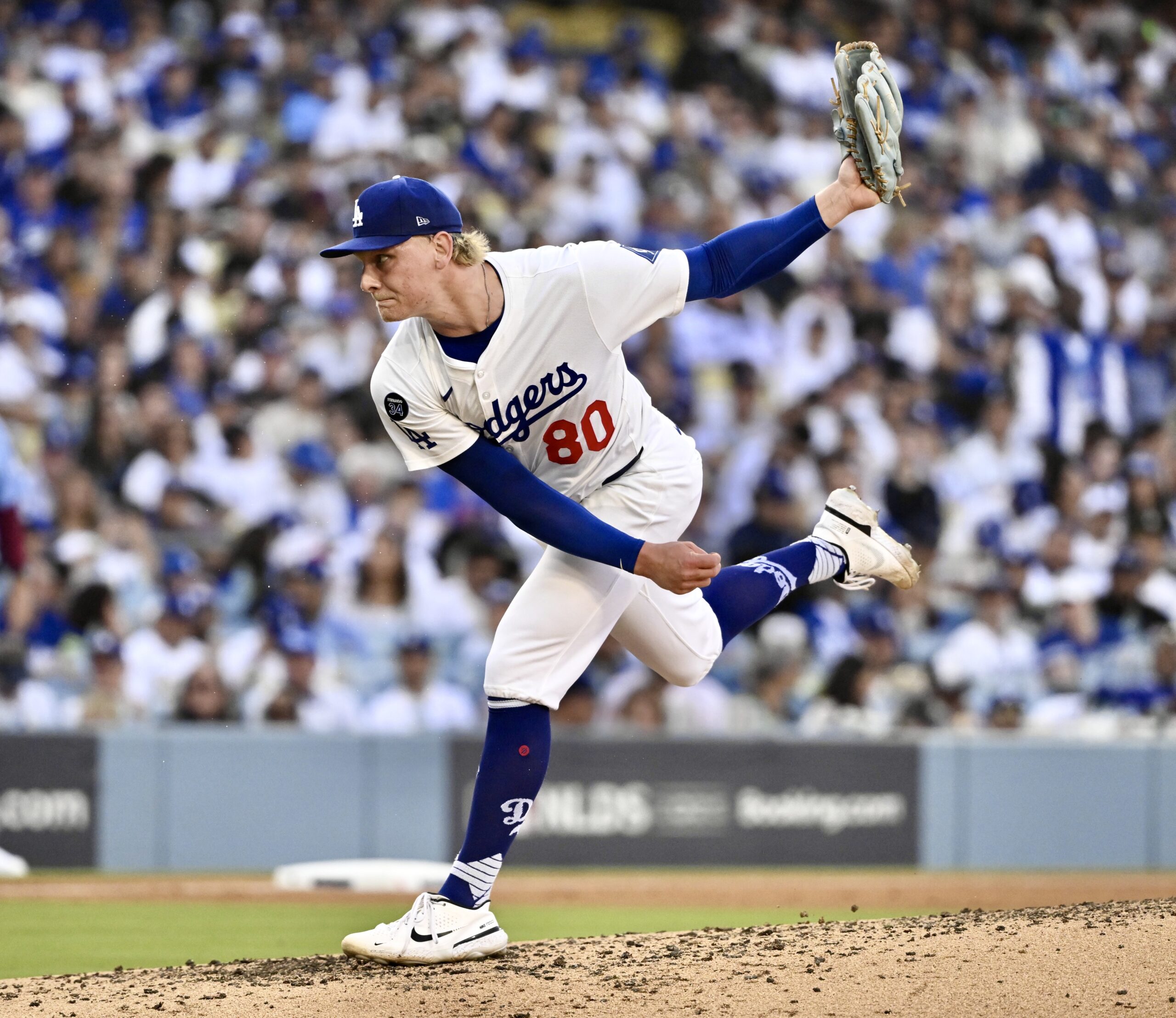 Dodgers relief pitcher Emmet Sheehan throws to the plate during...