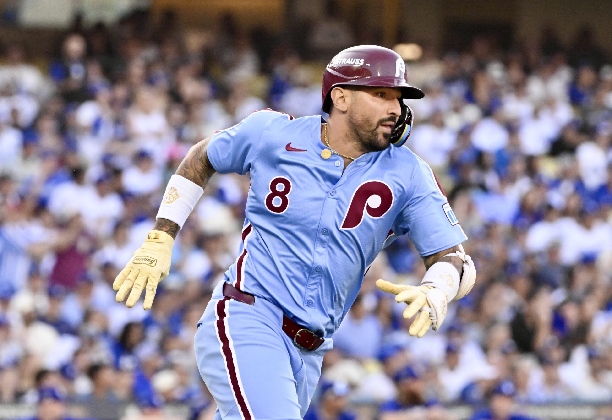 The Philadelphia Phillies’ Nick Castellanos runs after hitting an RBI...