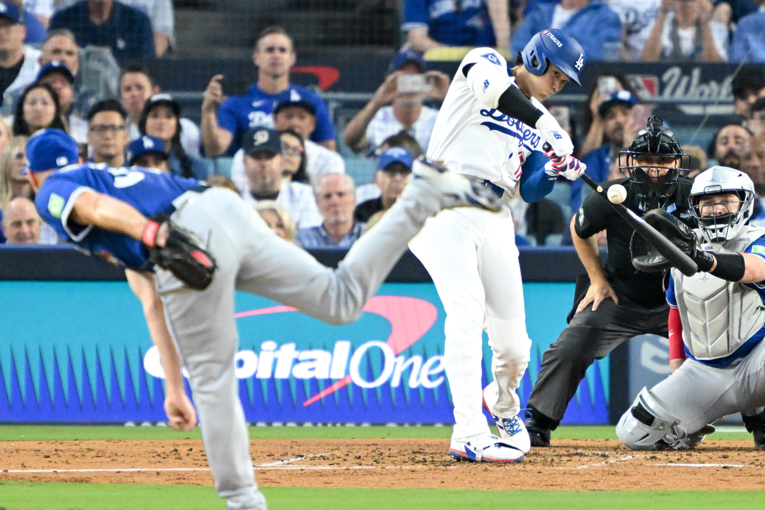 Dodgers star Shohei Ohtani connects for a solo home run...
