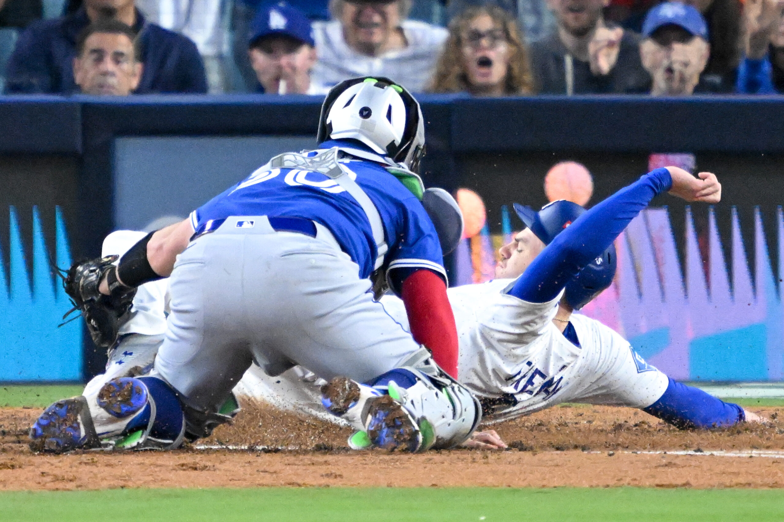 The Dodgers’ Freddie Freeman is tagged out at home by...